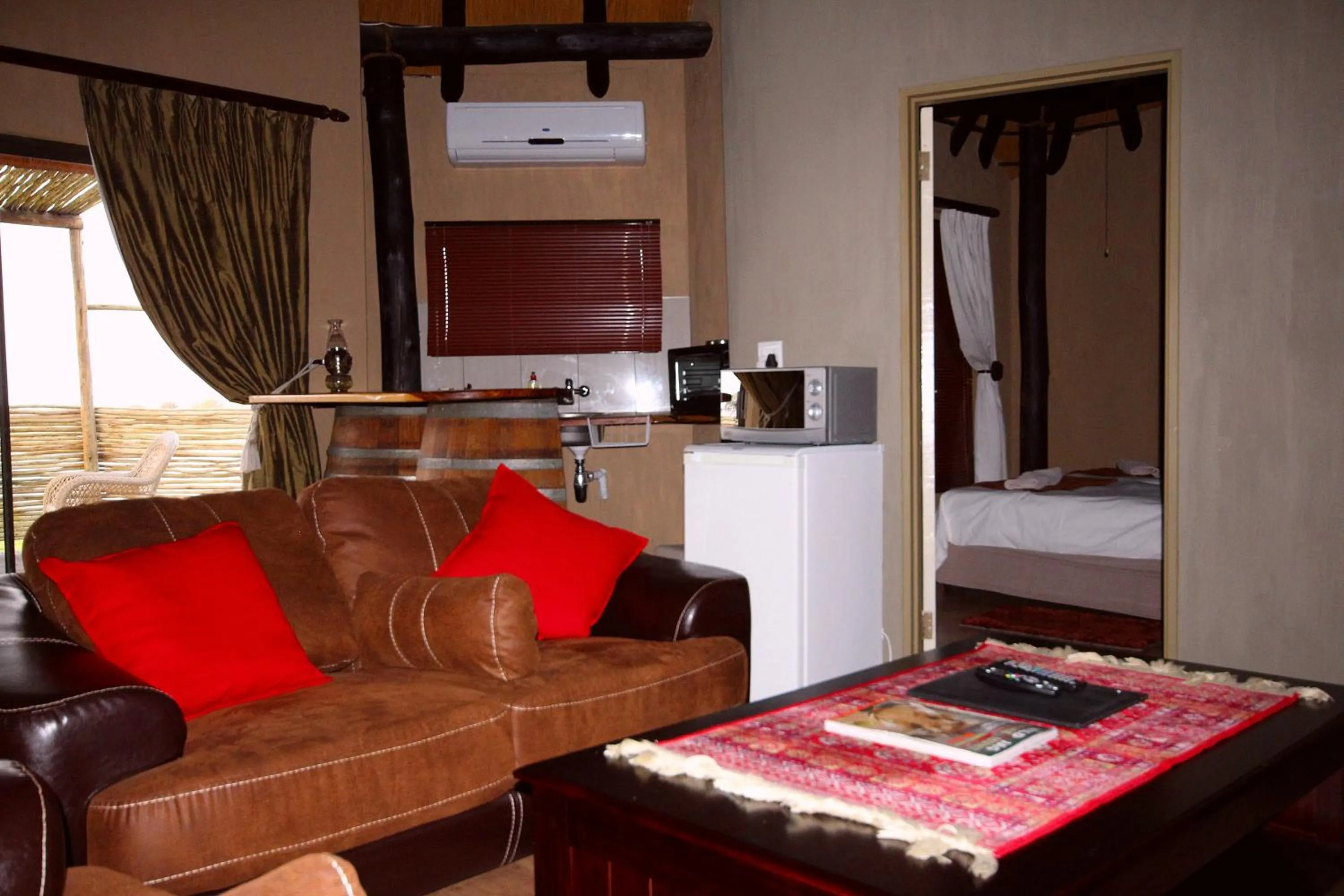 Seating area, Bed in Lapa Lange Game Lodge