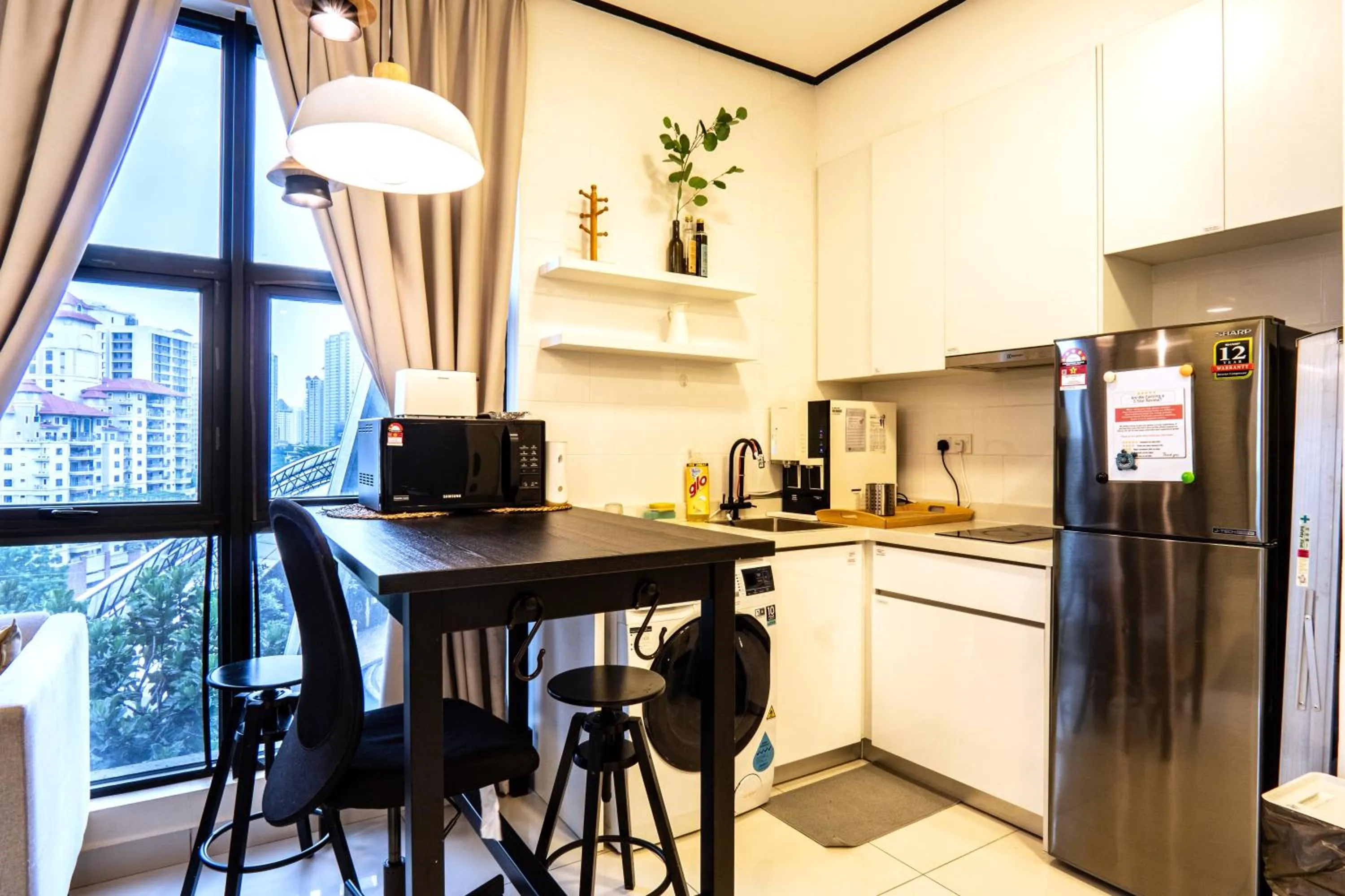 Kitchen or kitchenette in Arte Mont Kiara by Airhost