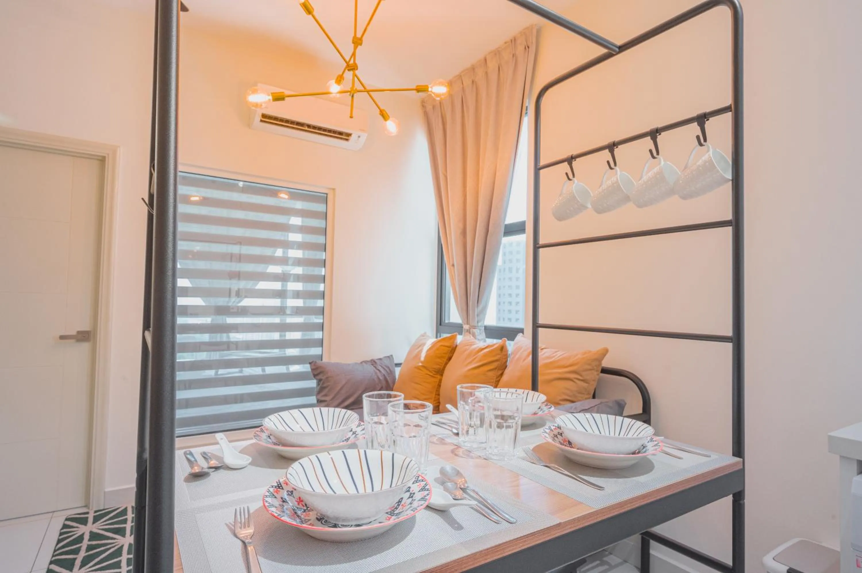 Dining area in Arte Mont Kiara by Airhost