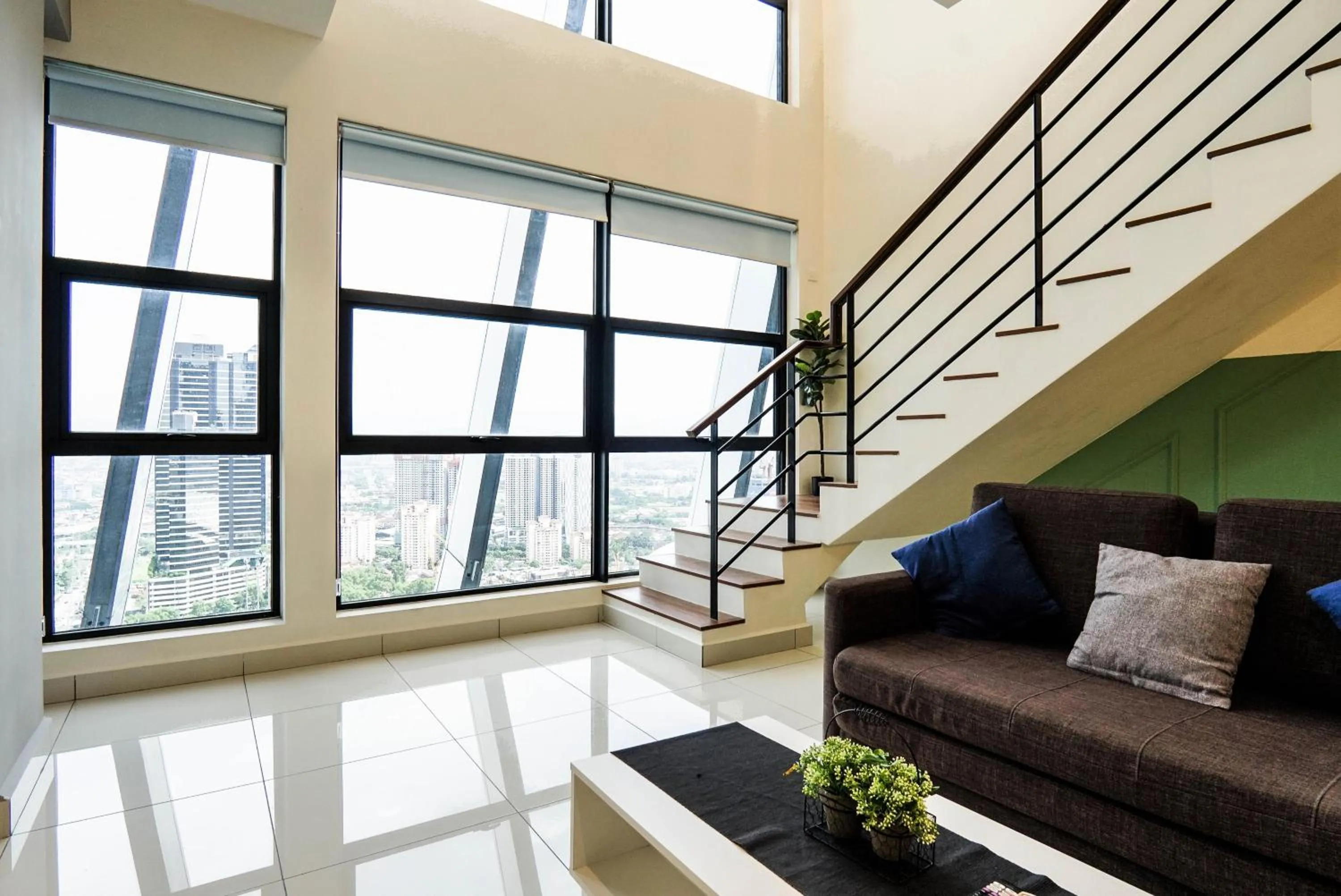 Living room in Arte Mont Kiara by Airhost