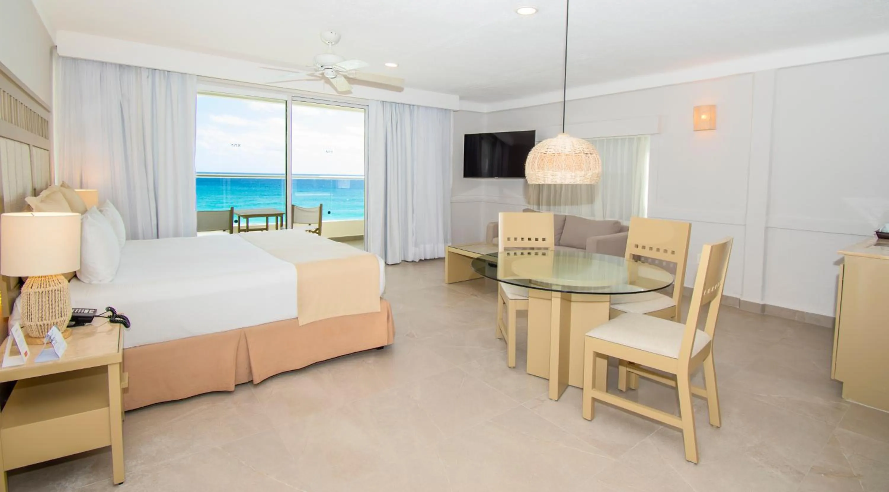 Photo of the whole room, Bed in Hotel NYX Cancun