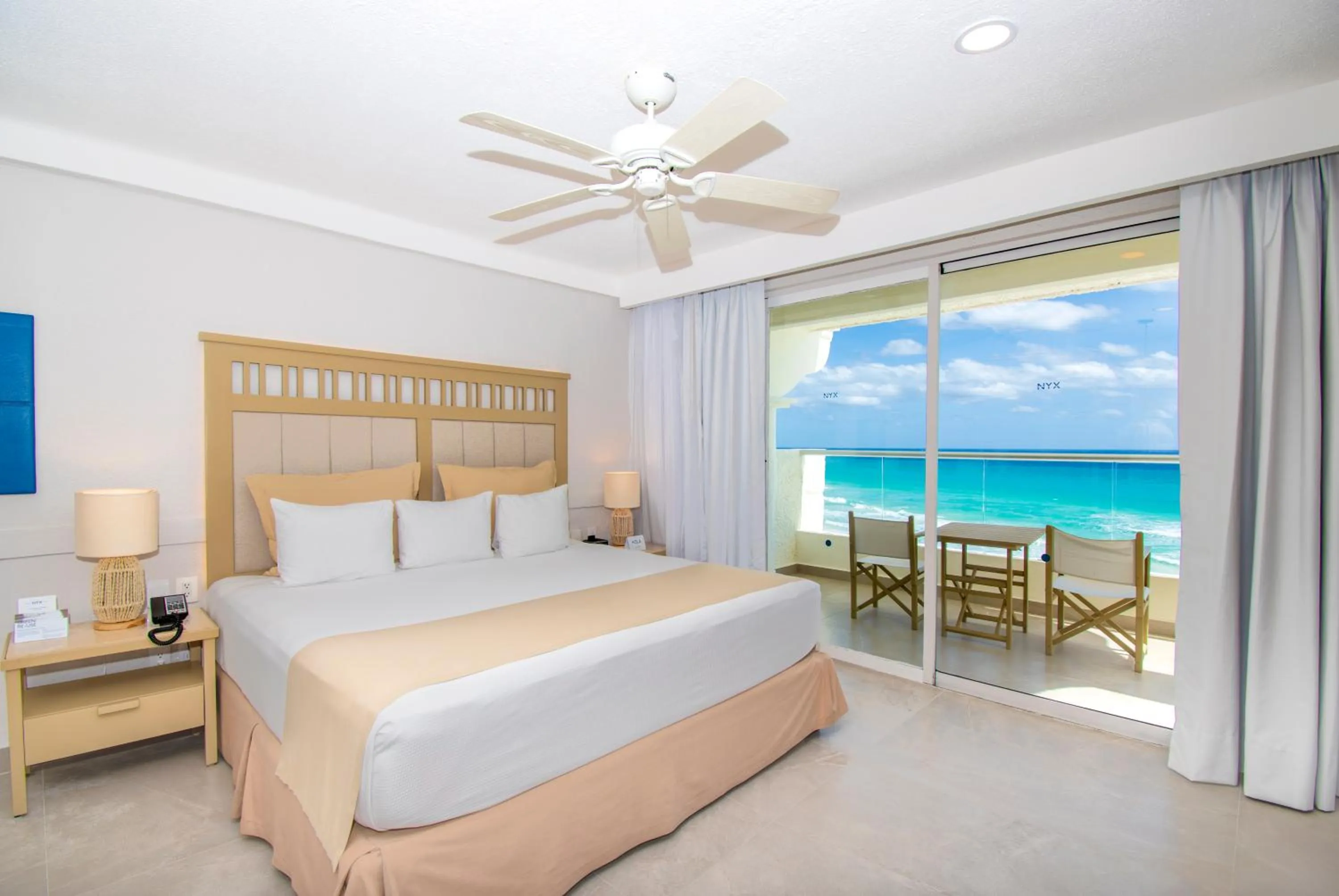 Photo of the whole room, Bed in Hotel NYX Cancun