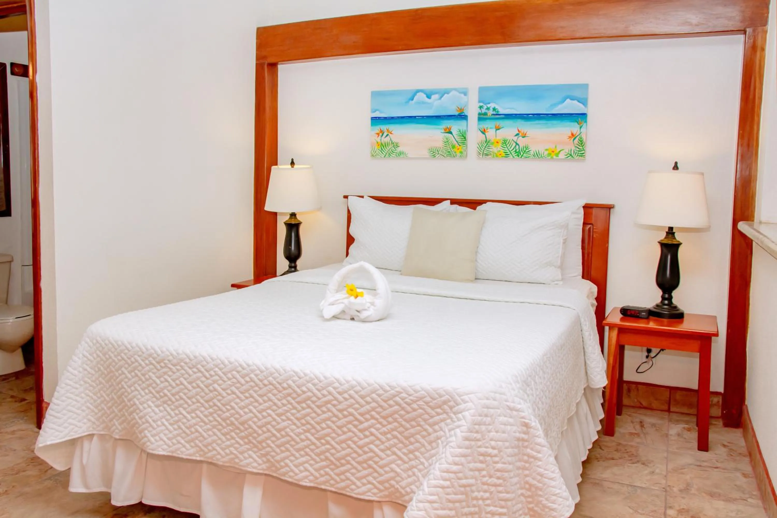 Bed in Mayan Princess Hotel