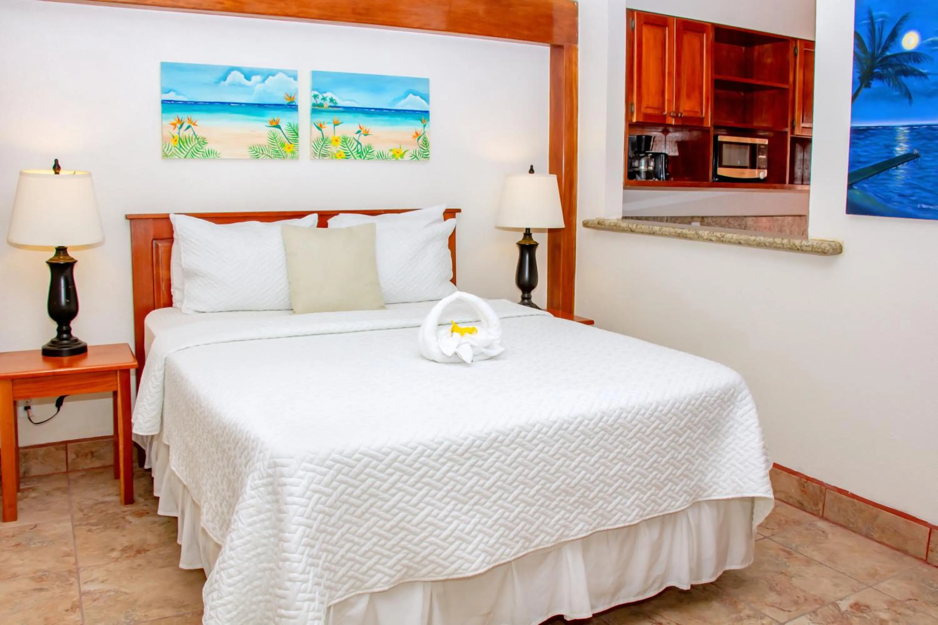 Bed in Mayan Princess Hotel