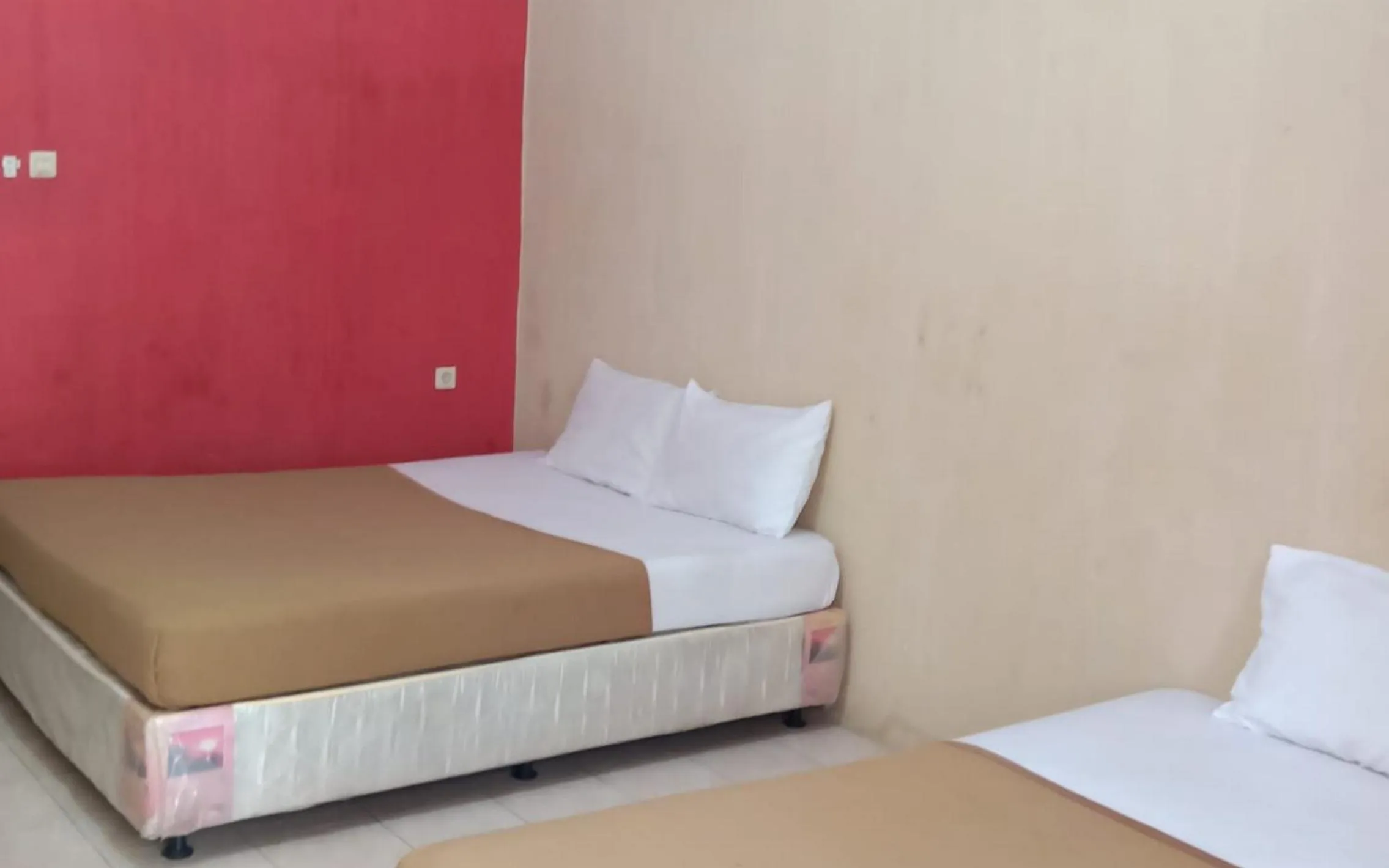 Bedroom, Bed in Hotel Nirwana Situbondo RedPartner