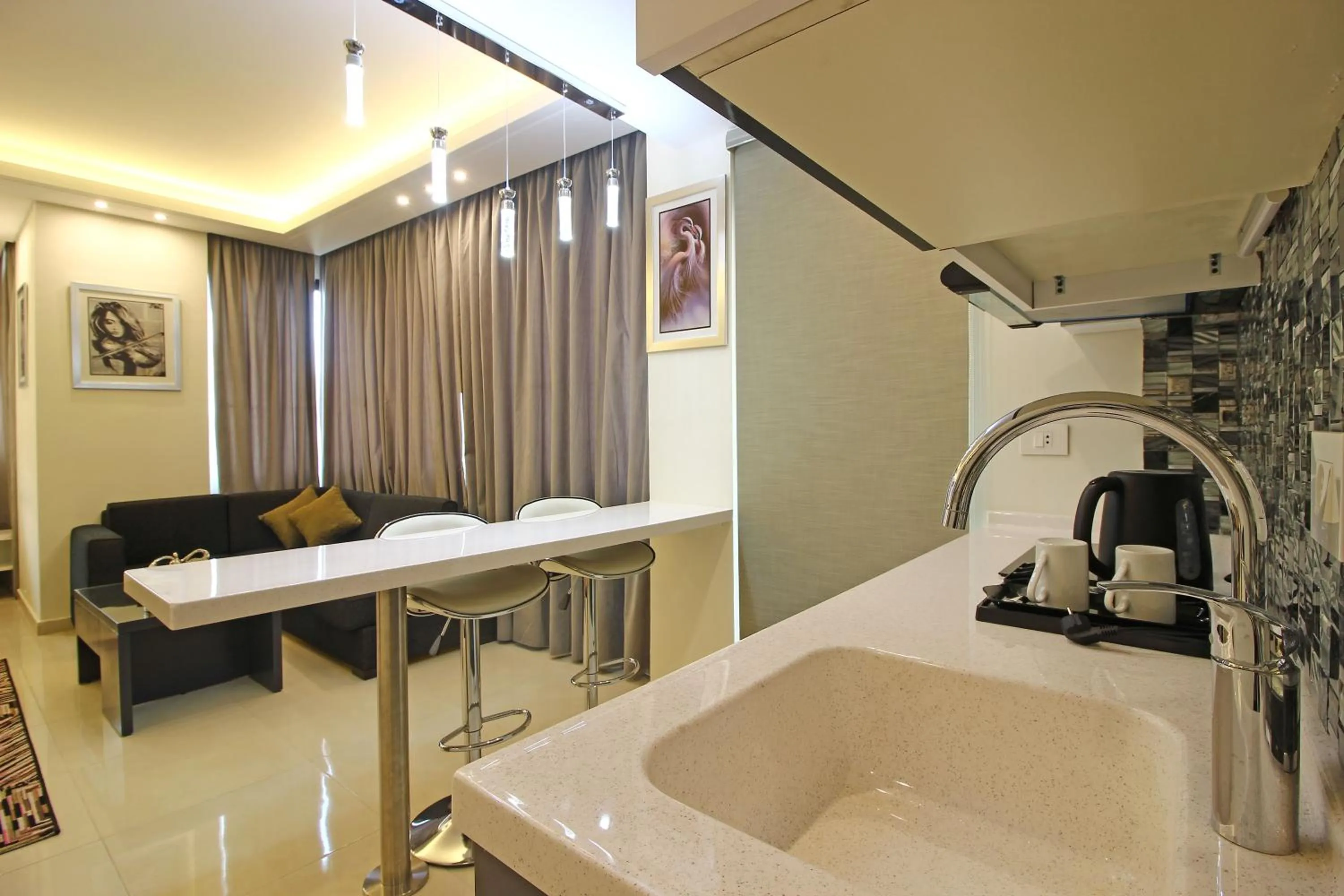 Kitchen or kitchenette in Palm Ville Suites