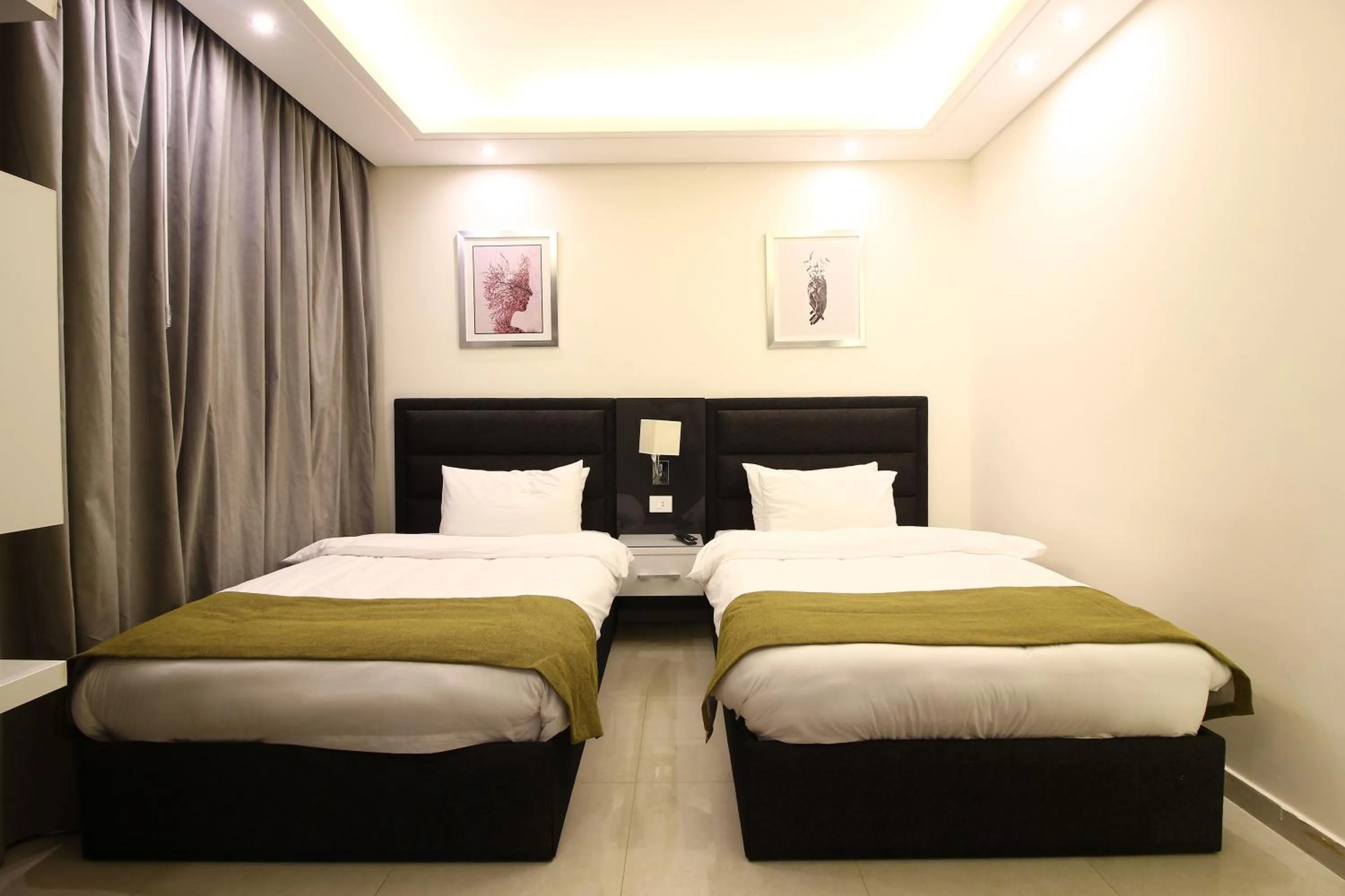 Bed in Palm Ville Suites