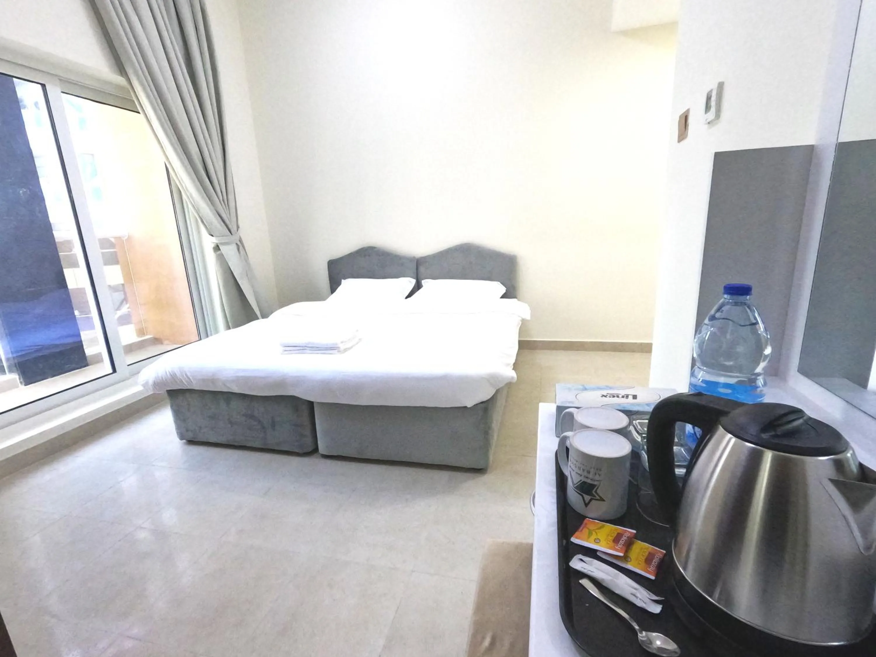 Bedroom, Bed in Barsha Star Residence - Home Stay