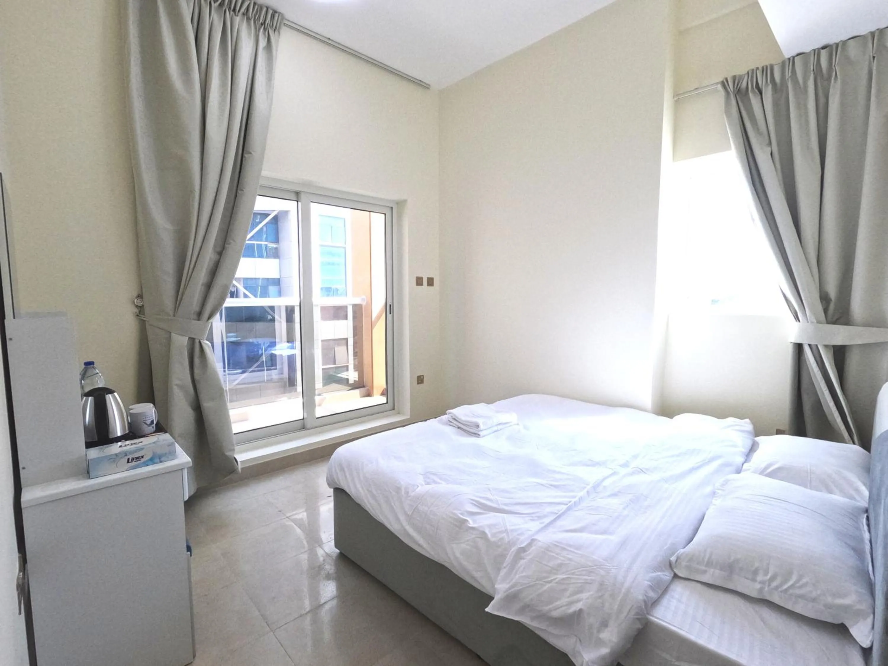 Bedroom, Bed in Barsha Star Residence - Home Stay