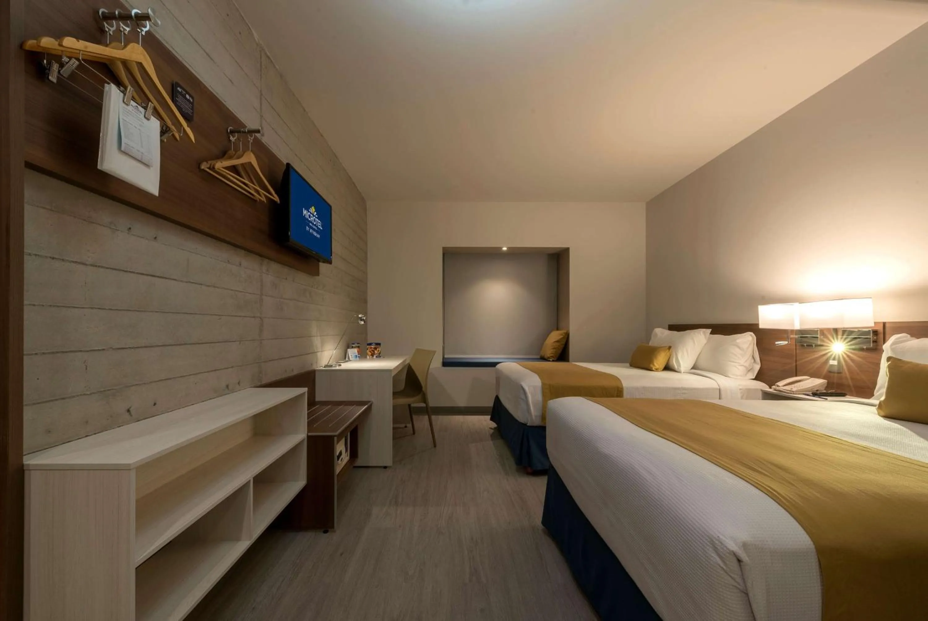 Photo of the whole room, Bed in Microtel Inn & Suites by Wyndham Guadalajara Sur