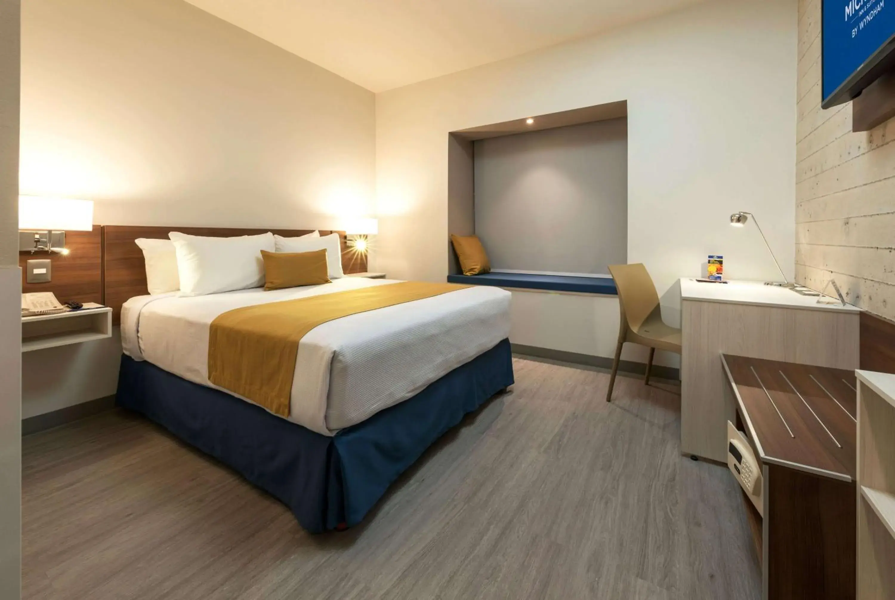 Bed in Microtel Inn & Suites by Wyndham Guadalajara Sur Bed in Microtel Inn & Suites by Wyndham Guadalajara Sur