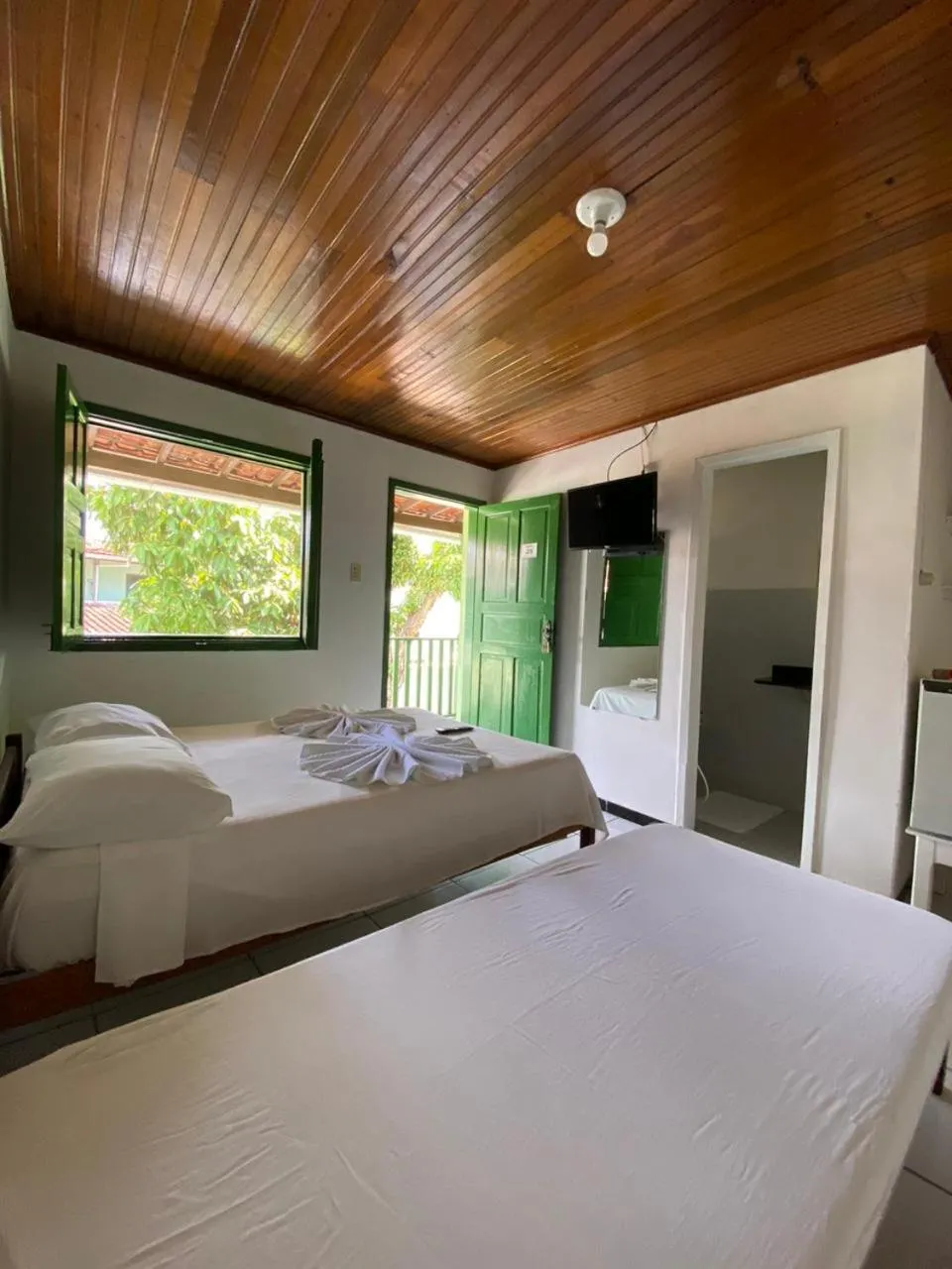Bed in Pousada Tapuia