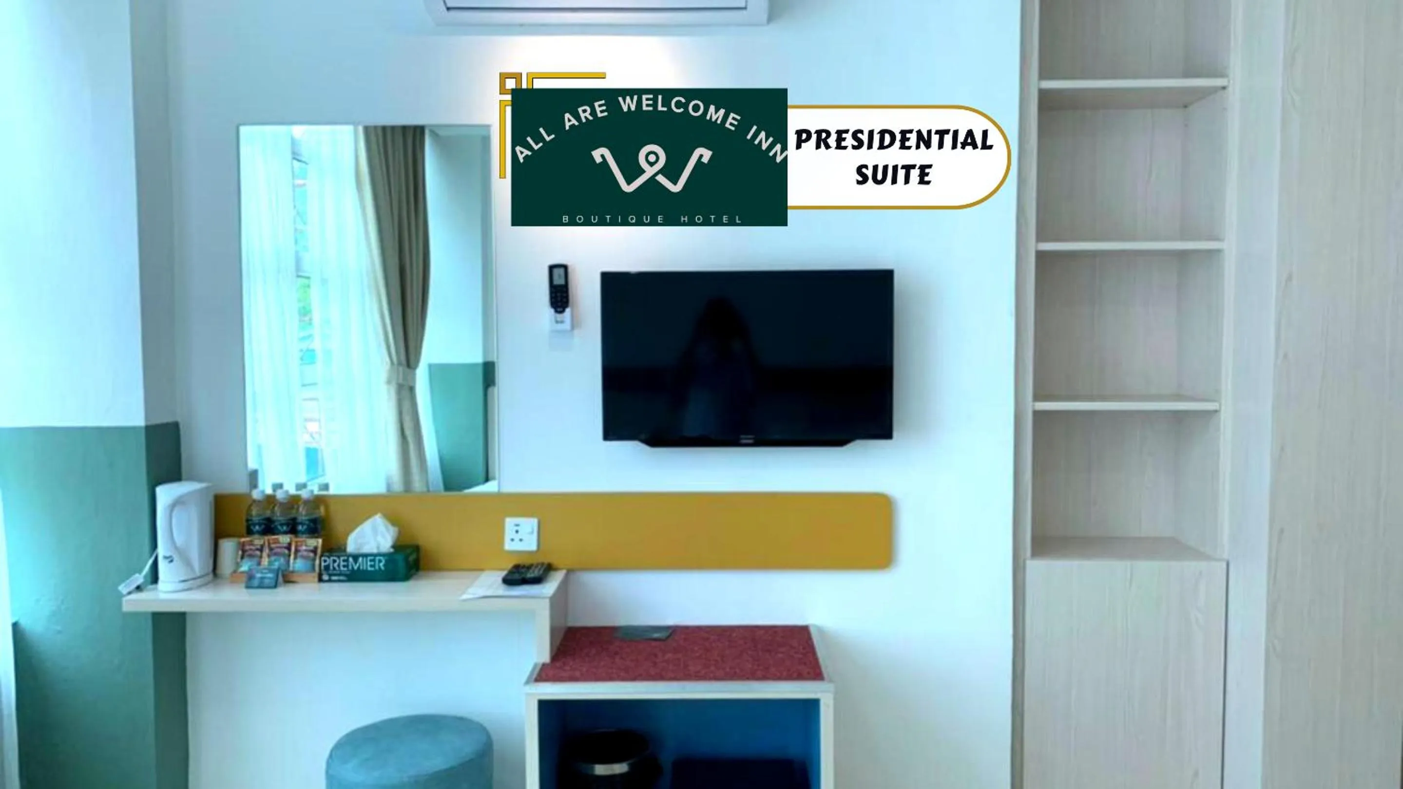 Communal lounge/ TV room in All Are Welcome Lawas Boutique Hotel