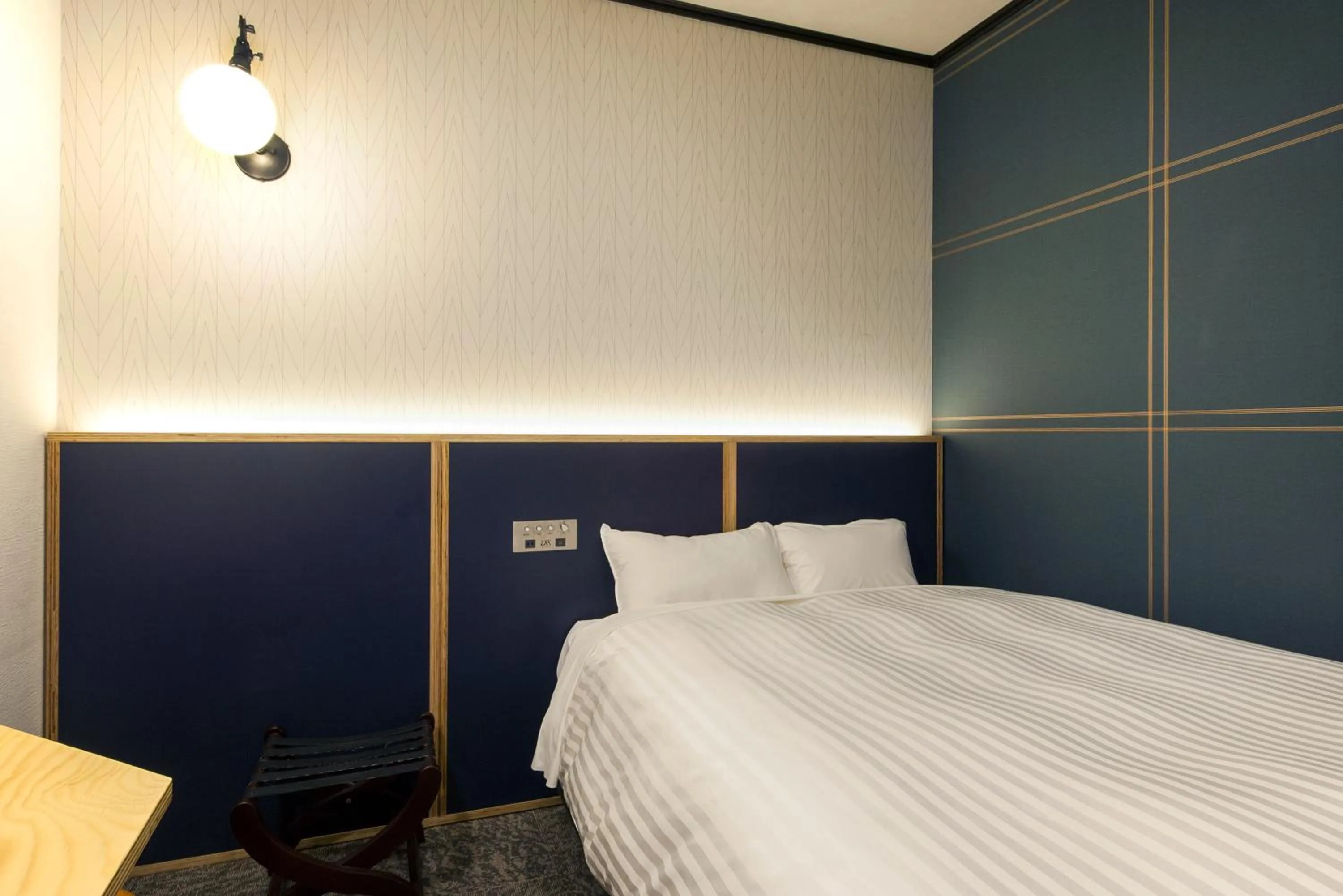 Bed in TsukubaNoYu Urban Hotel