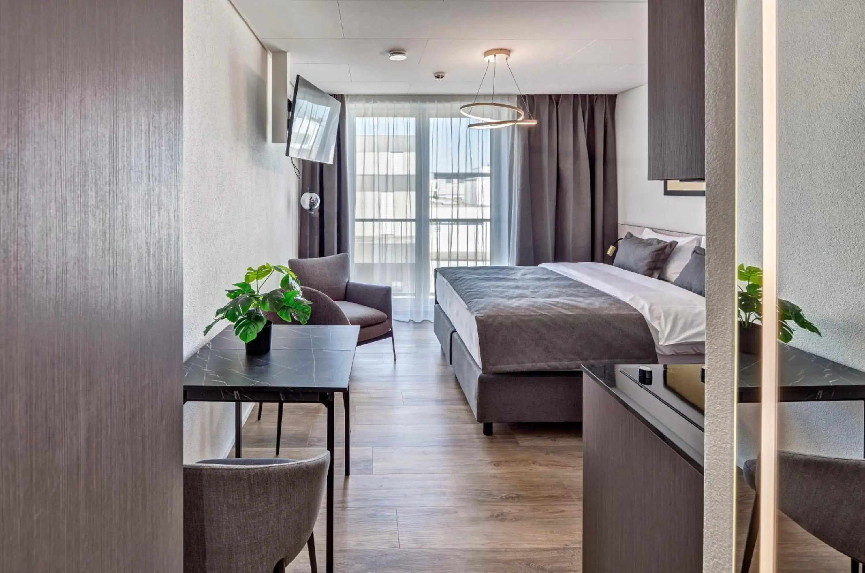Photo of the whole room, Bed in MOOI Apartments Schlieren Photo of the whole room, Bed in MOOI Apartments Schlieren