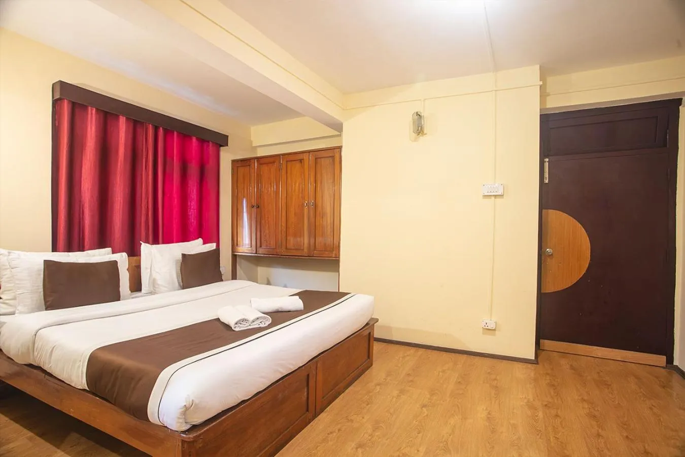 Bedroom in Magpie Mall Road Residency (MG Marg)