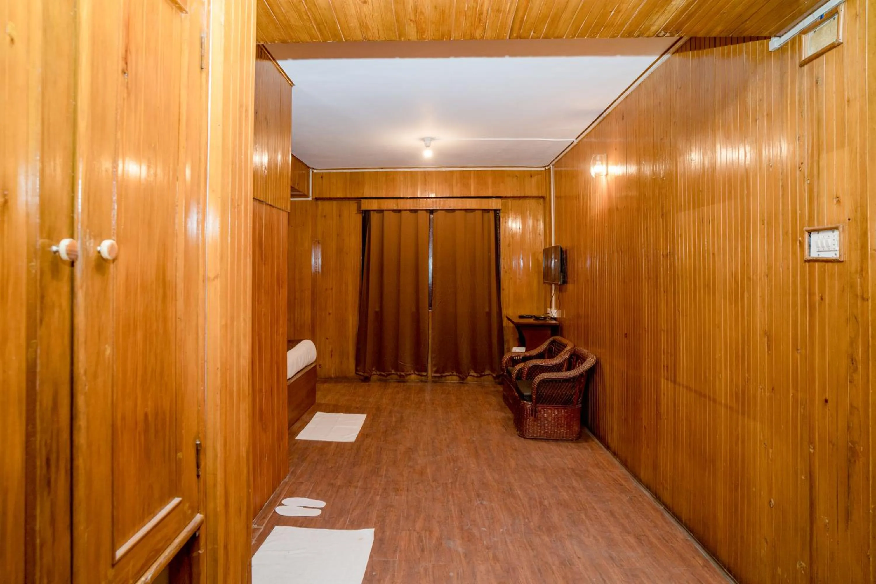 Bedroom in Magpie Mall Road Residency (MG Marg)