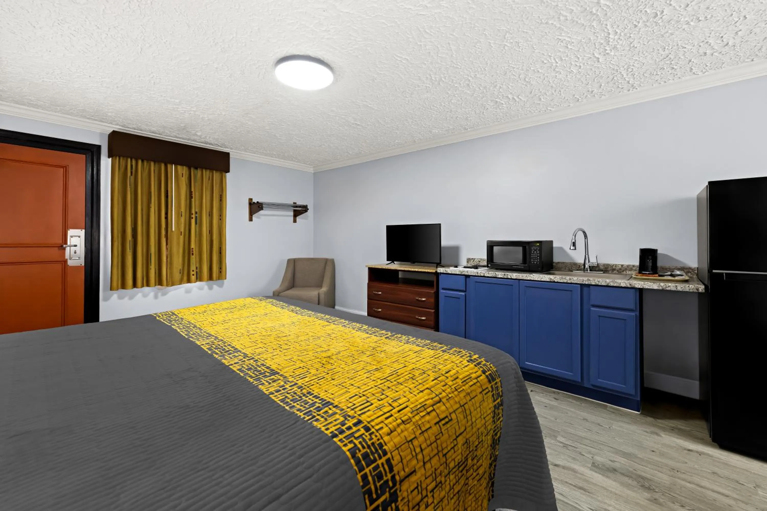 Bedroom, Bed in Village Haven Inn & Extended Stay