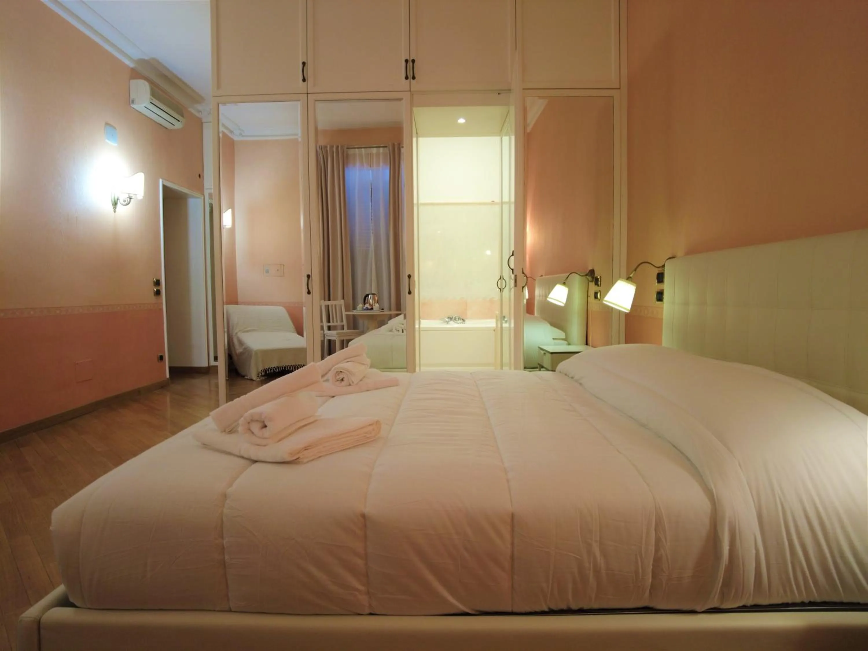 Bed in Gardoce's Guest House