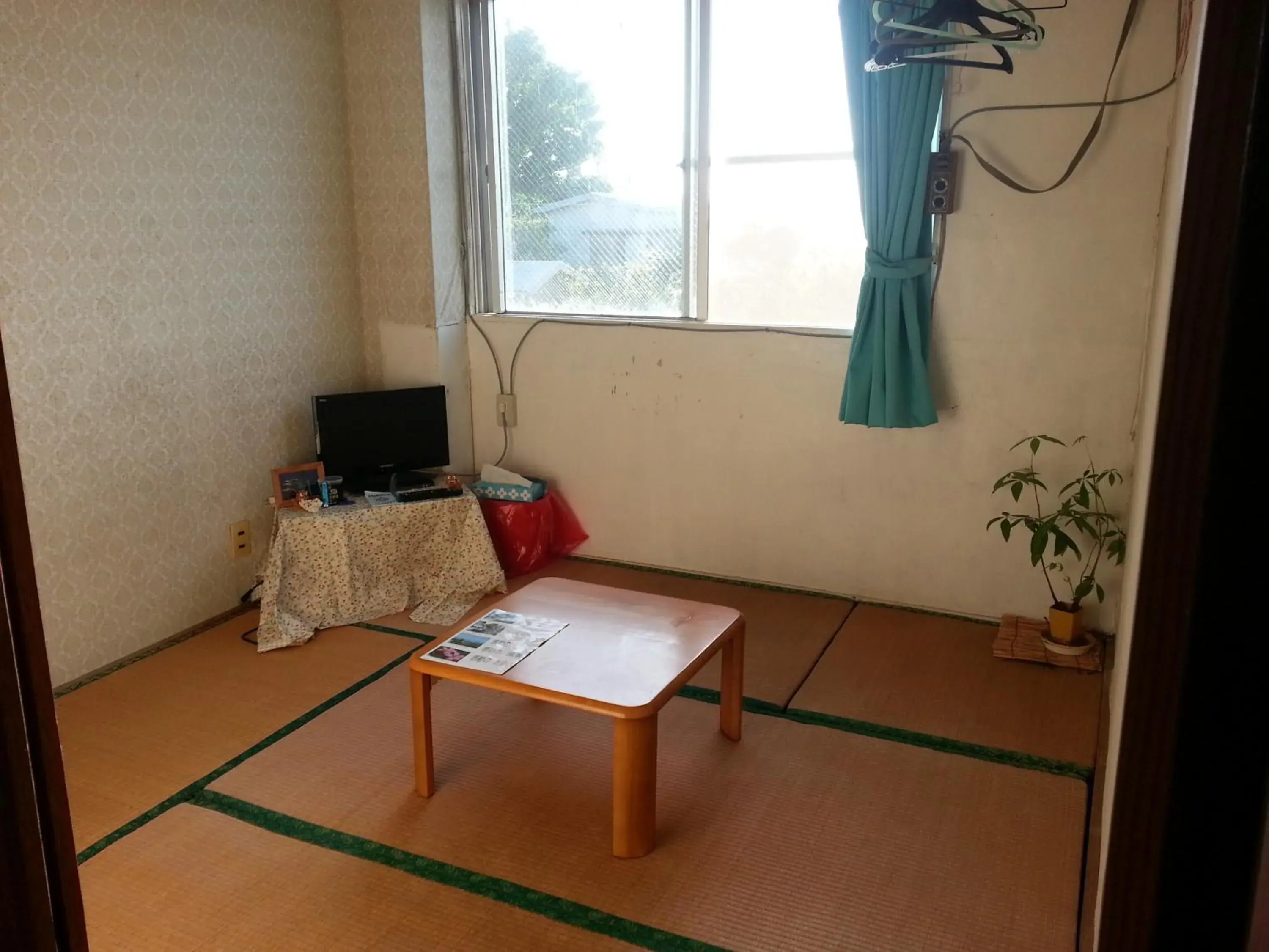 Japanese-Style Economy Room with Shared Bathroom and Sea View in Minshuku Myojoso Japanese-Style Economy Room with Shared Bathroom and Sea View in Minshuku Myojoso