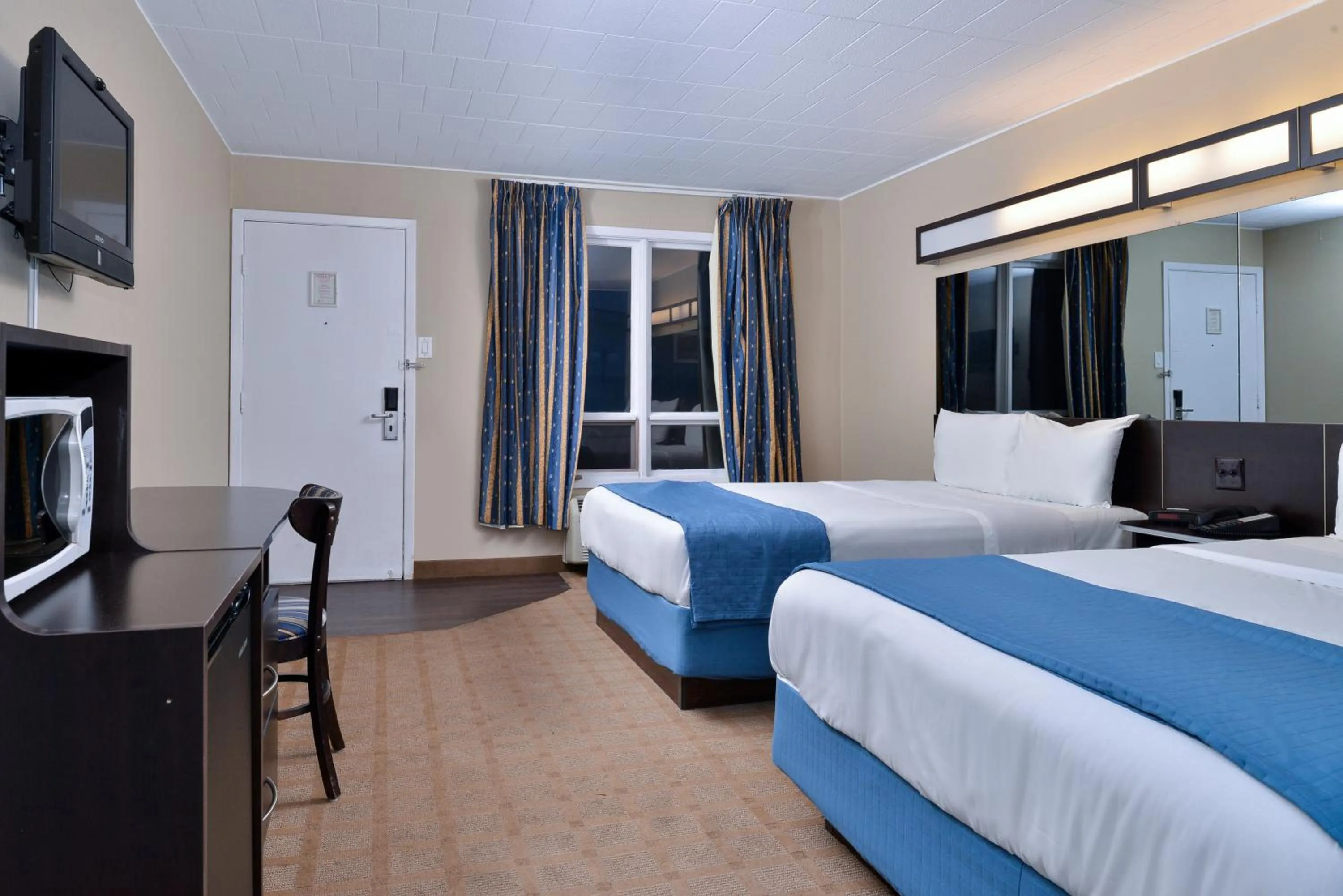 Bedroom, Bed in Canadas Best Value Inn St. Catharines