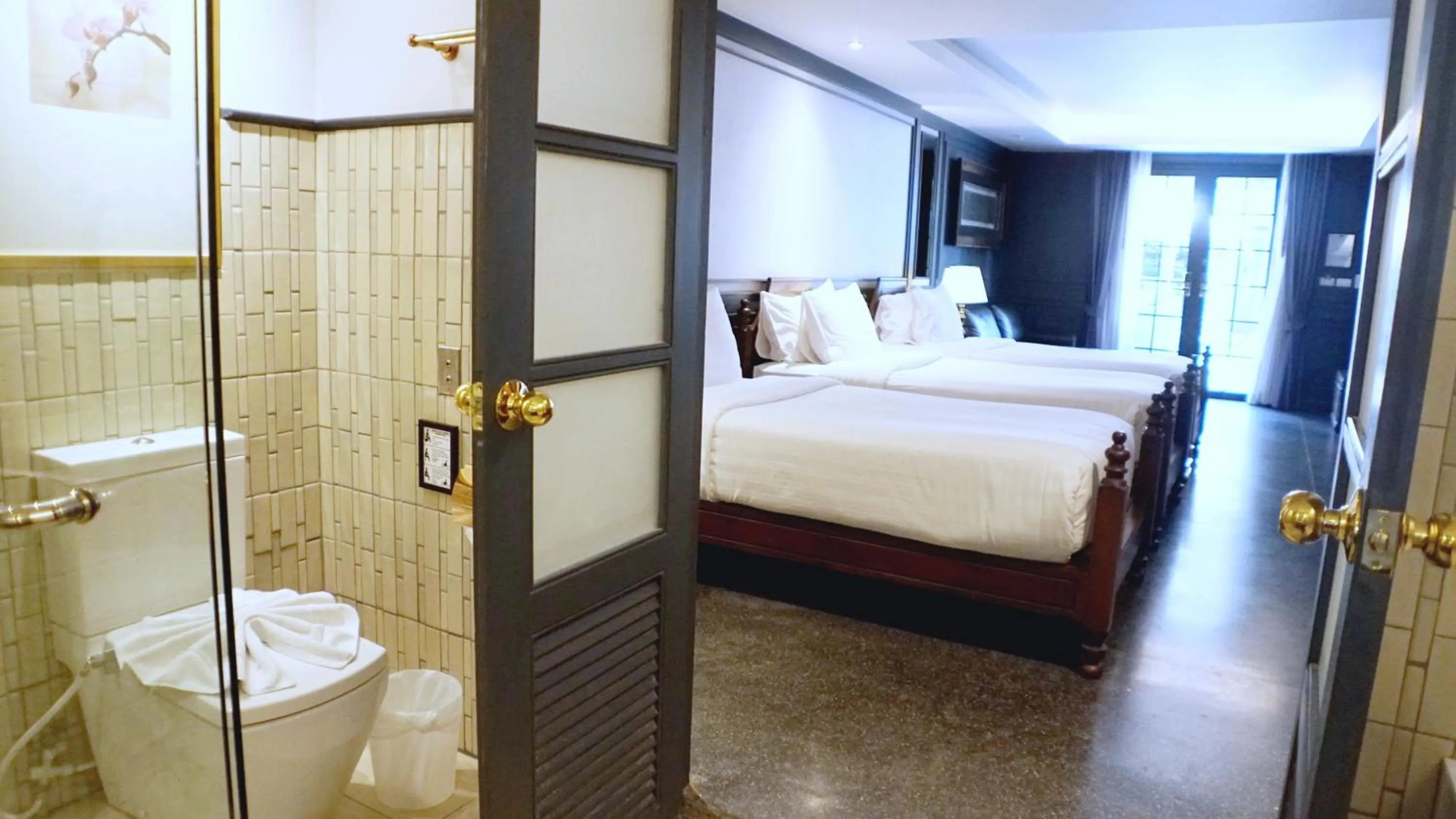 Toilet, Bed in Buri Sriping Riverside Resort & Spa