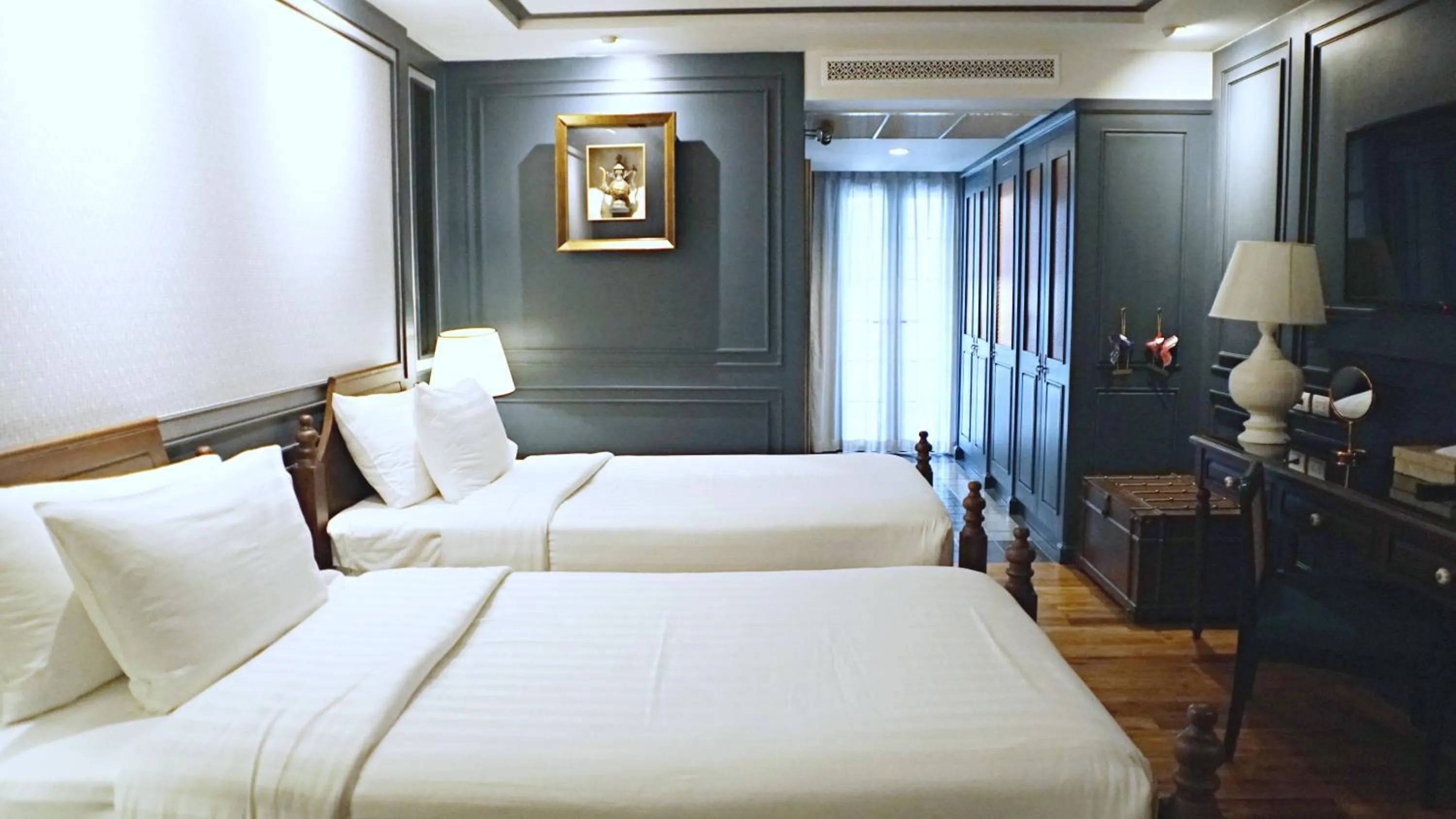 Bed in Buri Sriping Riverside Resort & Spa