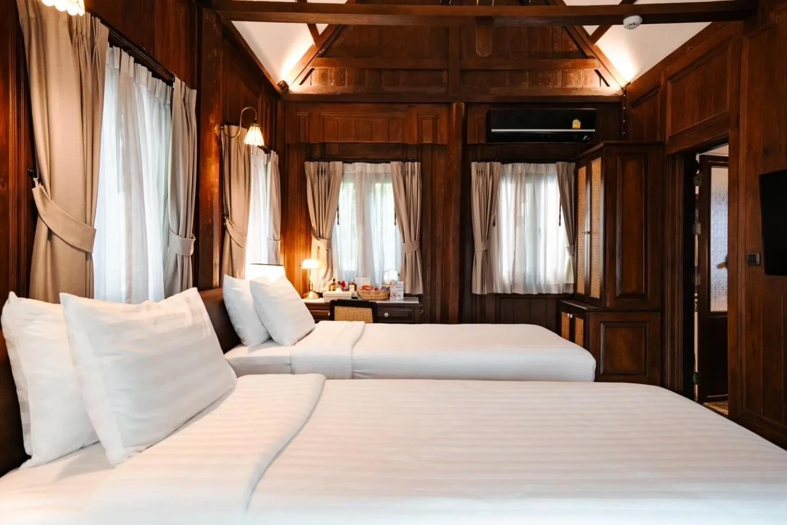 Bed in Buri Sriping Riverside Resort & Spa