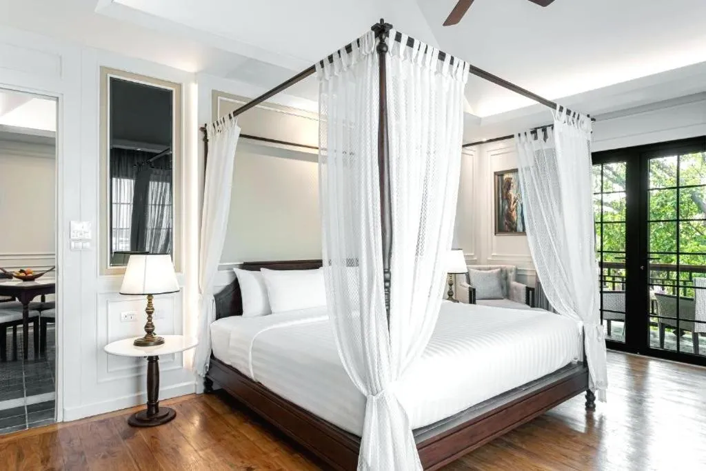 Bed in Buri Sriping Riverside Resort & Spa