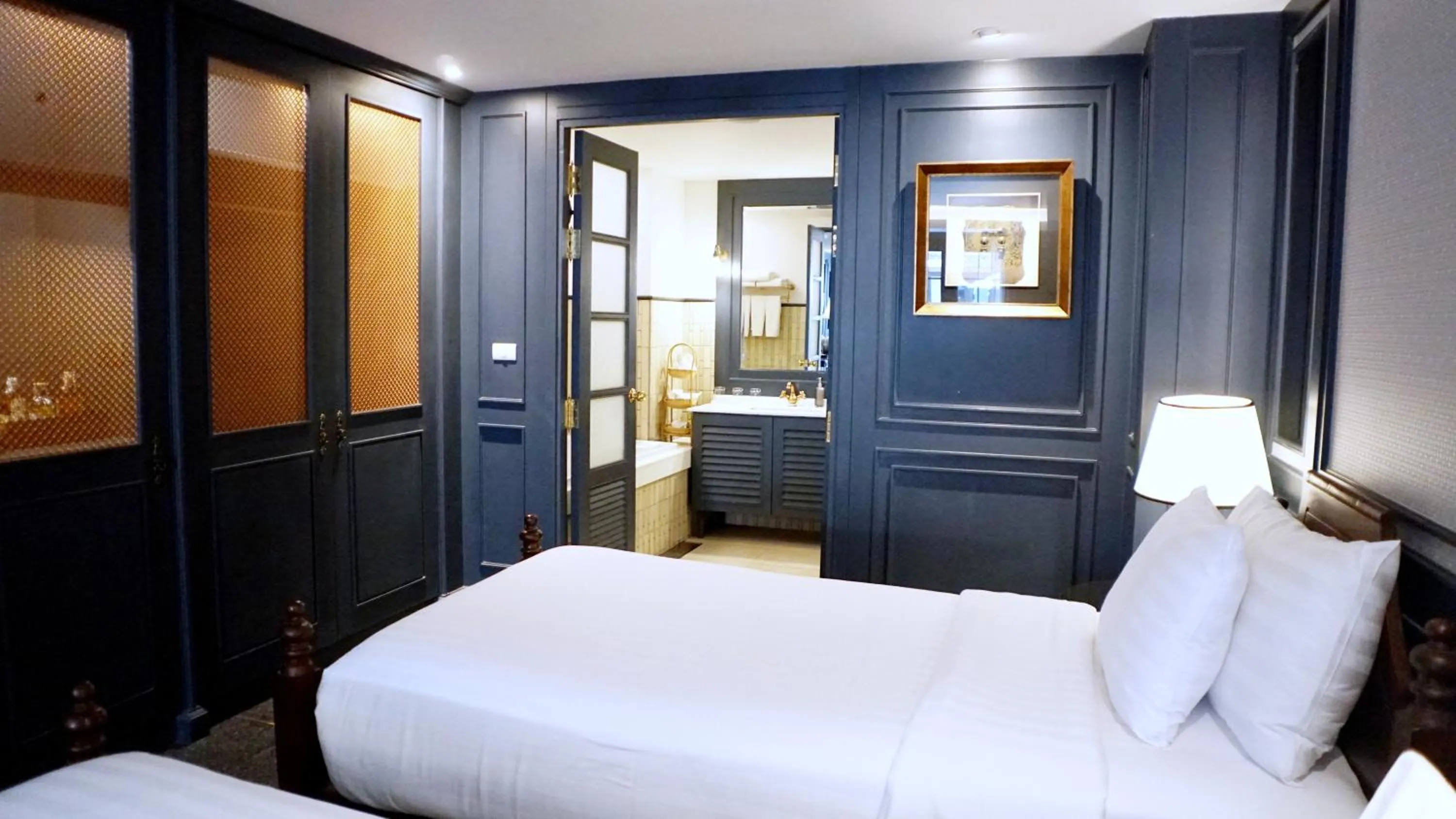 Bed in Buri Sriping Riverside Resort & Spa