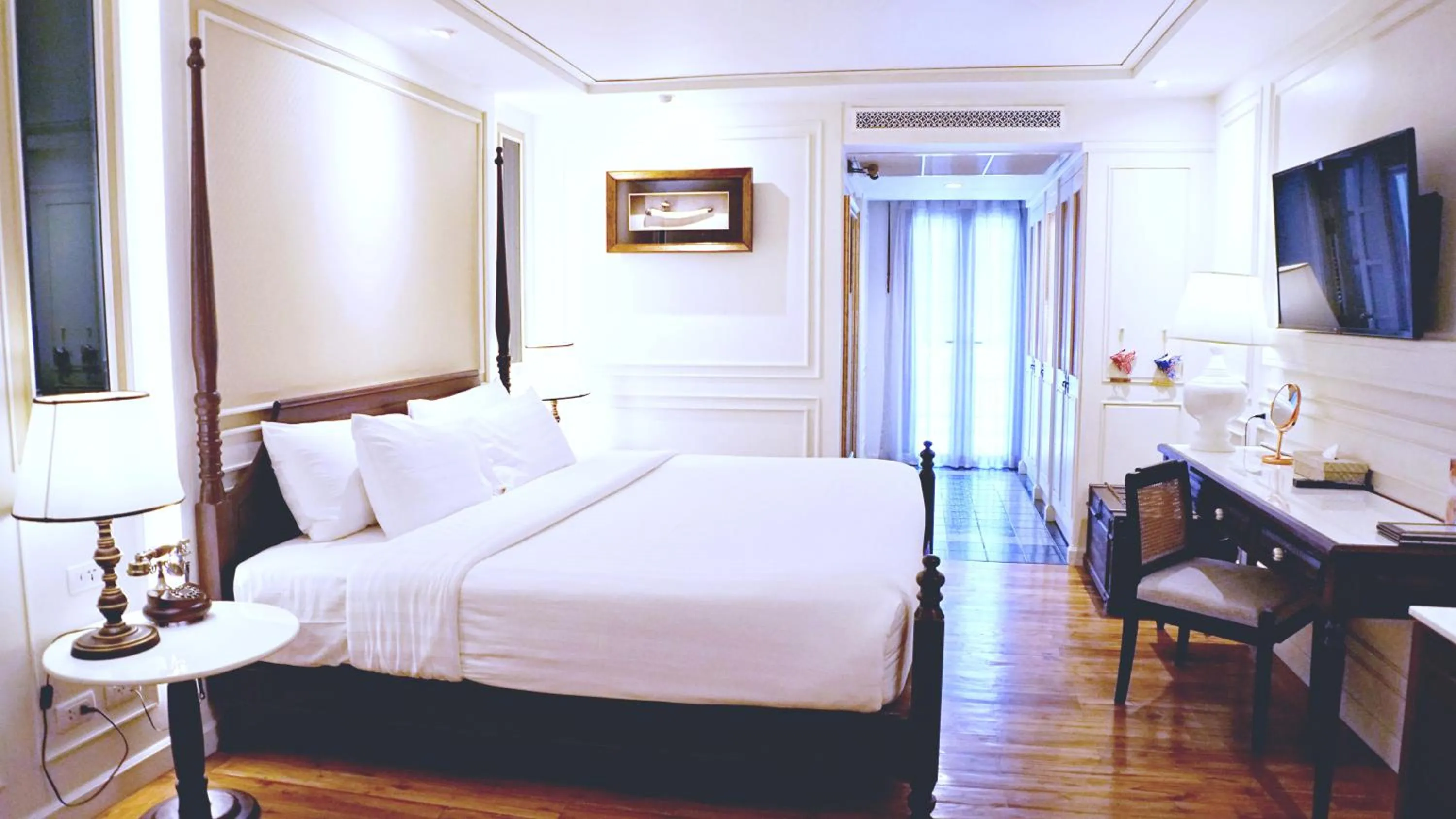 Communal lounge/ TV room, Bed in Buri Sriping Riverside Resort & Spa