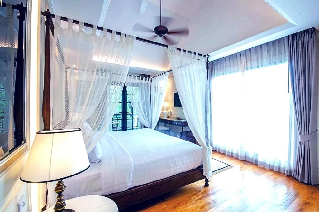 Bed in Buri Sriping Riverside Resort & Spa