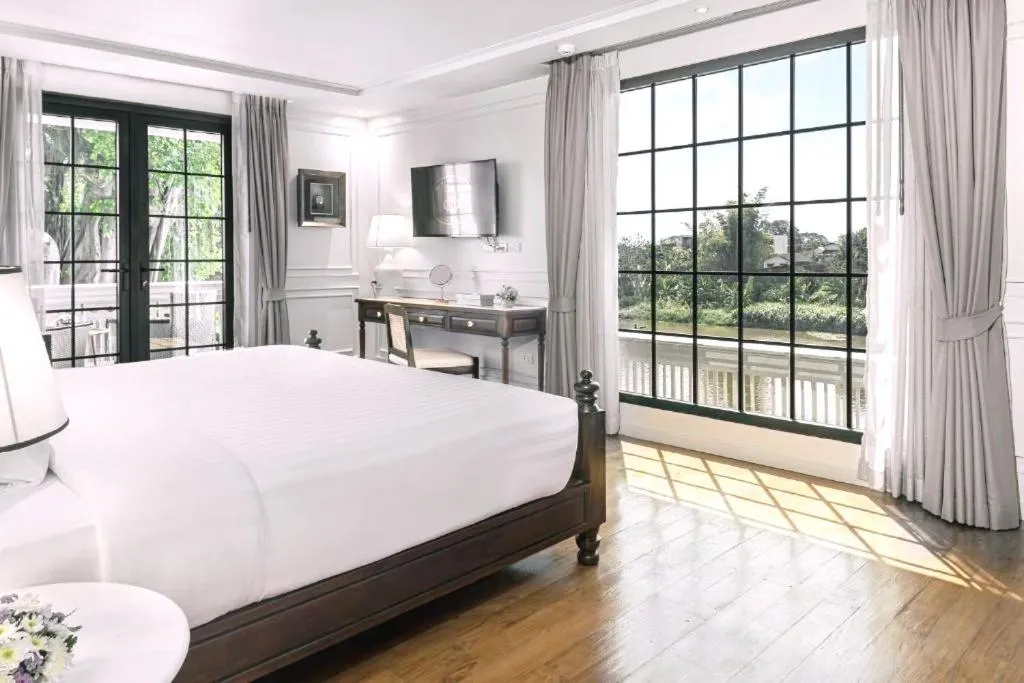 Bed in Buri Sriping Riverside Resort & Spa