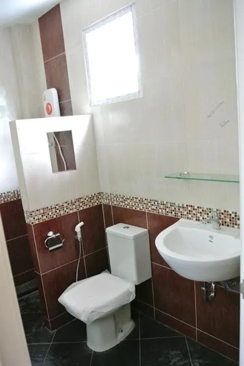 Bathroom in Color Ville Hotel SHA Certified
