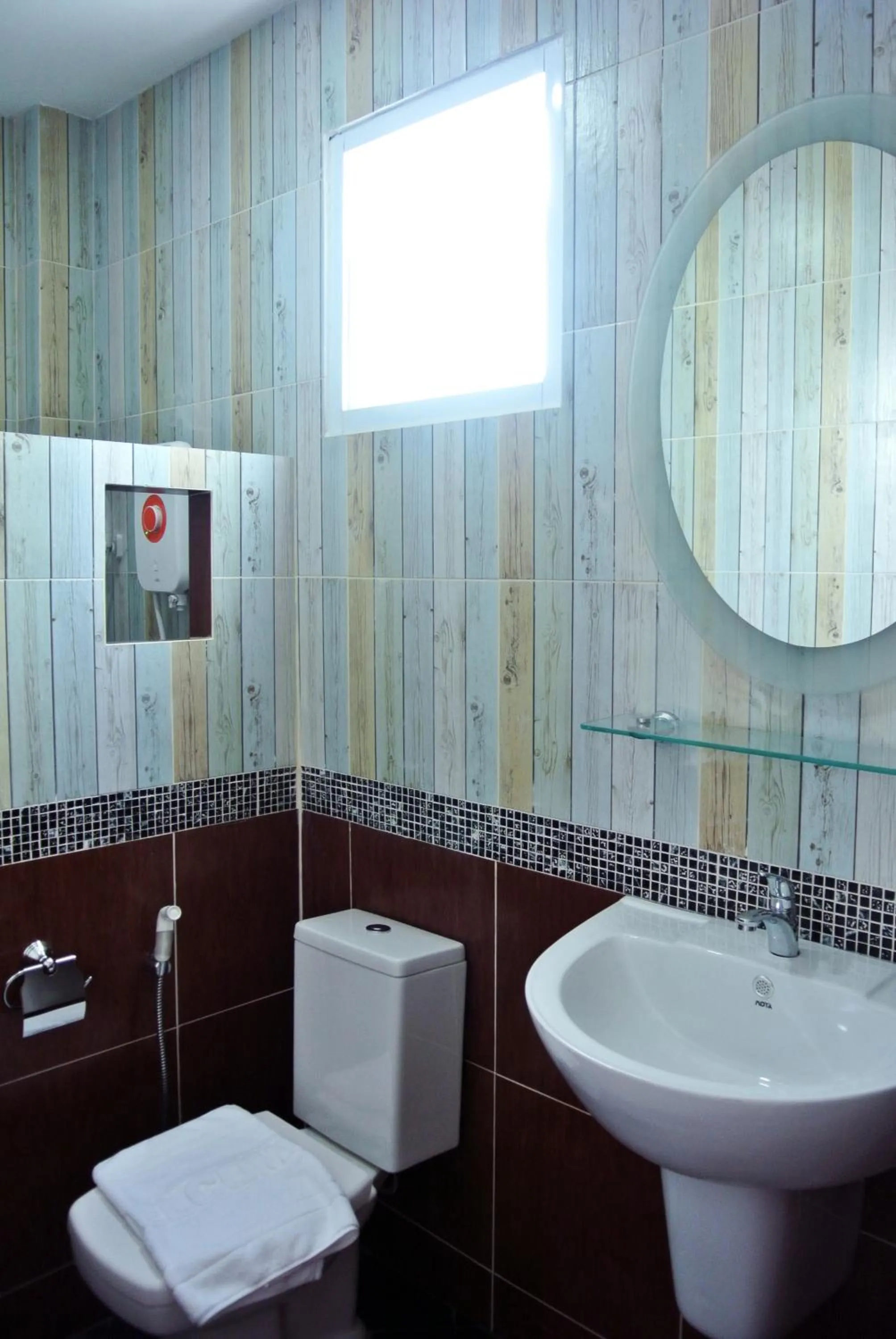 Bathroom in Color Ville Hotel SHA Certified