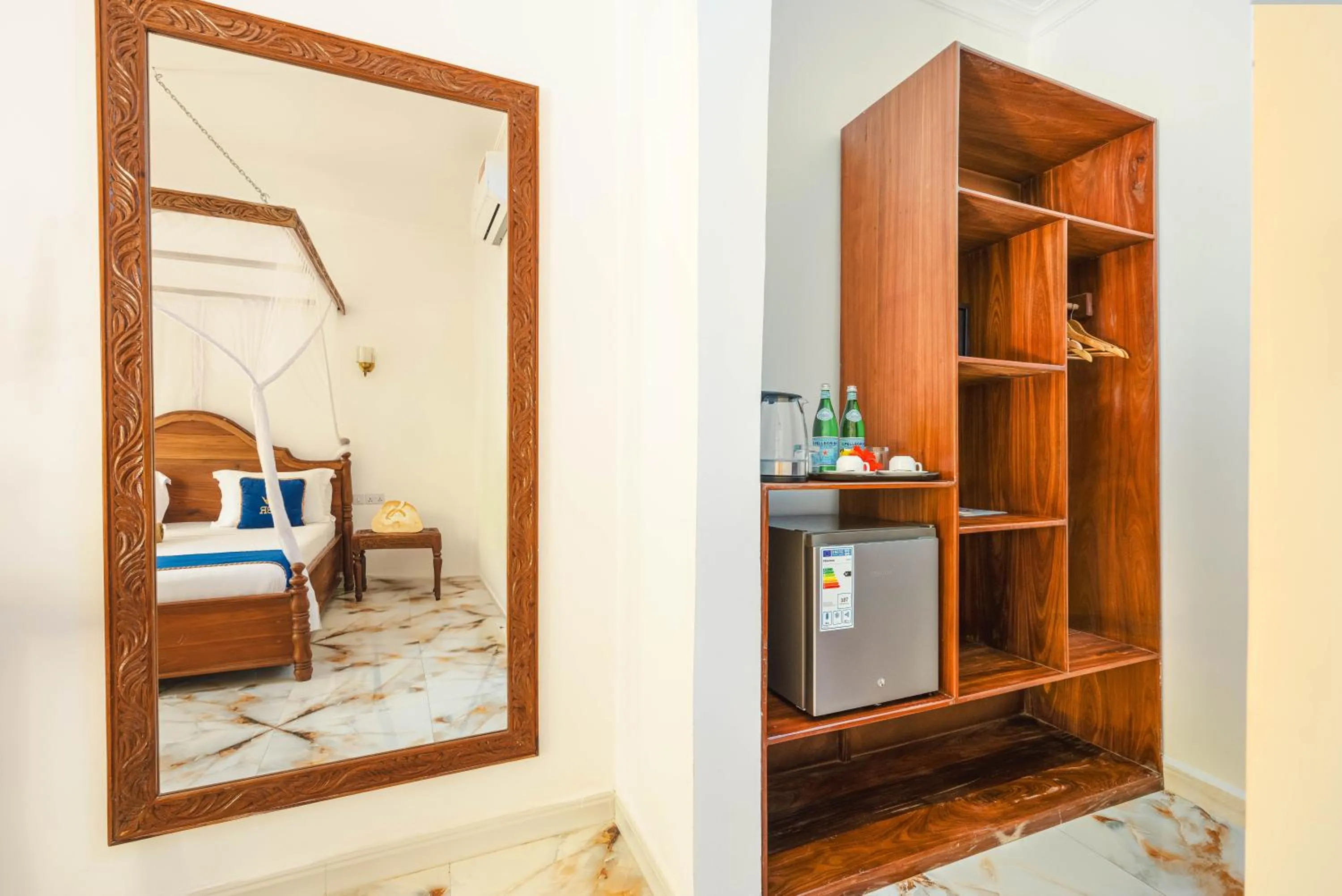 Photo of the whole room, Bed in Karibu Beach Resort