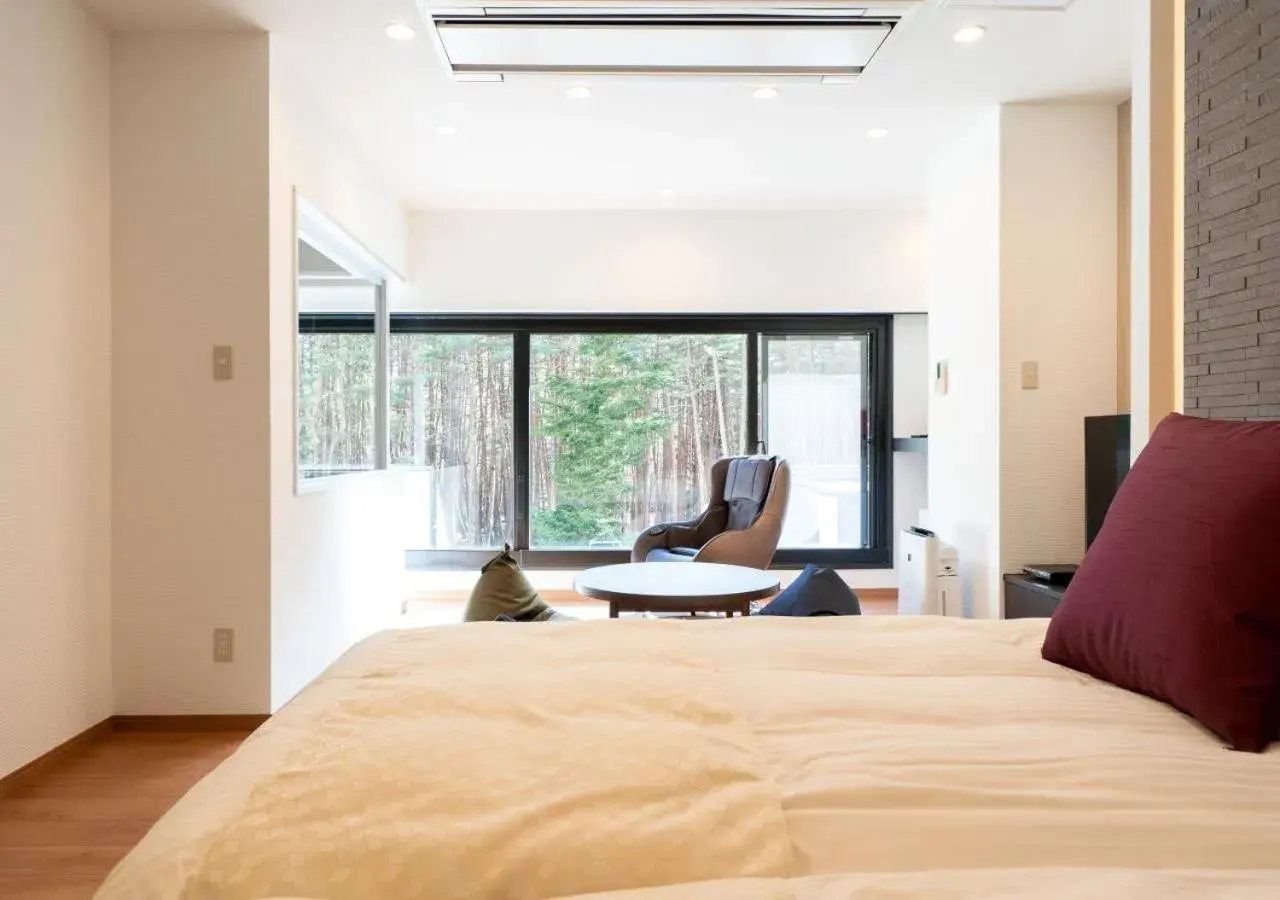 Living room, Bed in Yatsugatake Hotel Fuuka Living room, Bed in Yatsugatake Hotel Fuuka