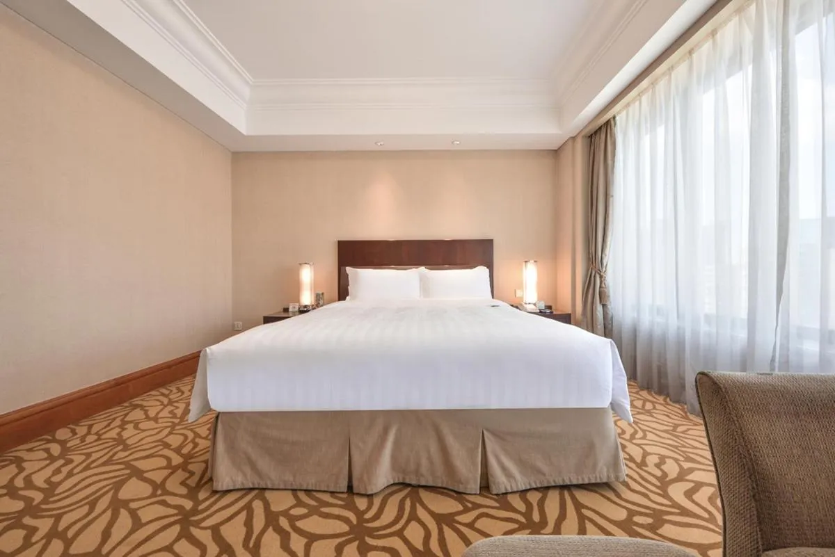 Bed in Furama Hotel Dalian