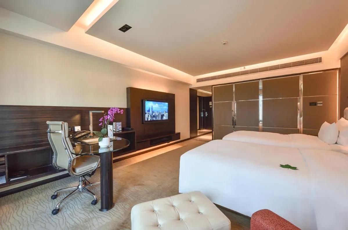 Bed in Furama Hotel Dalian