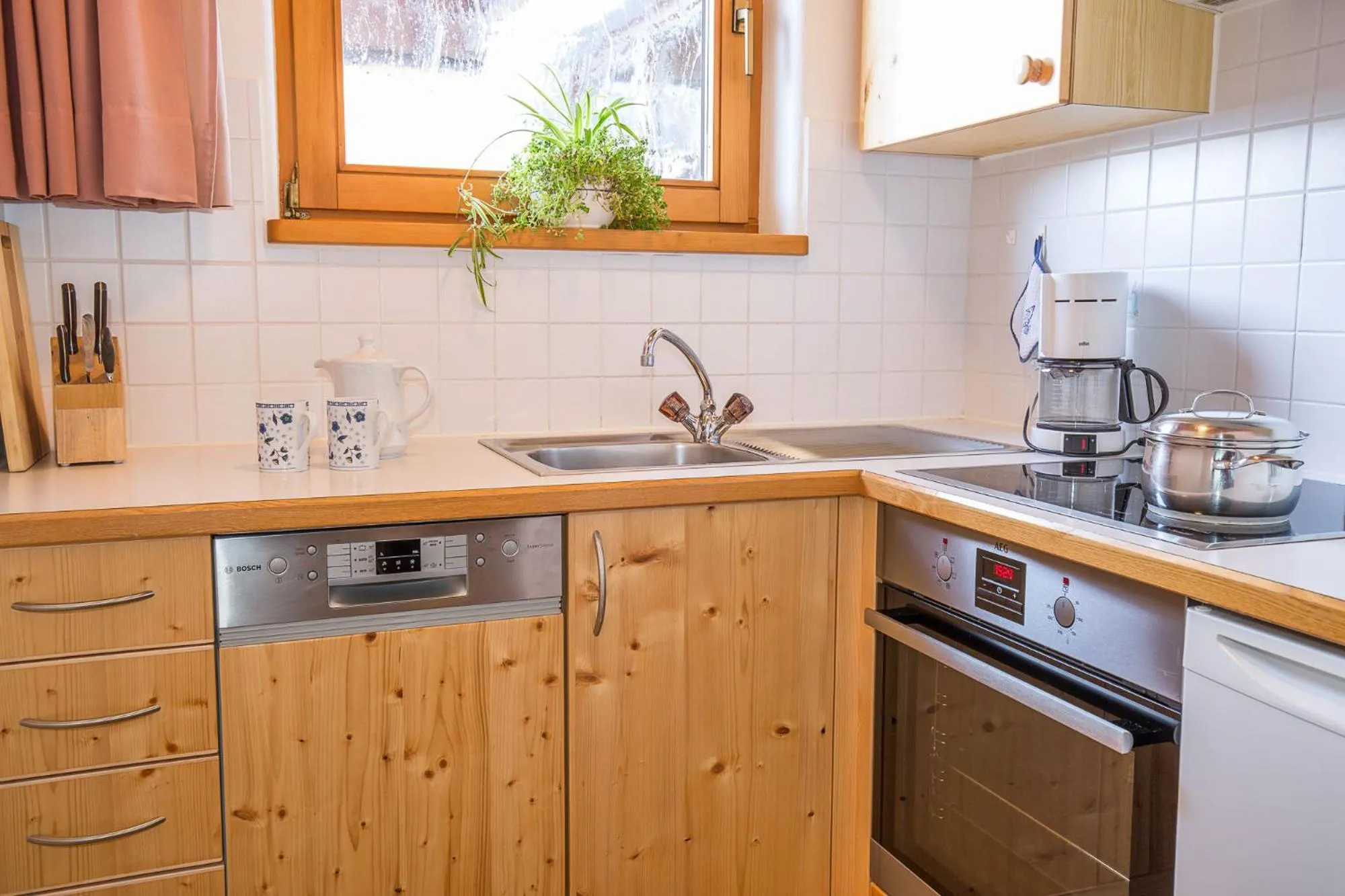 Kitchen or kitchenette in Ferienhaus Aurora