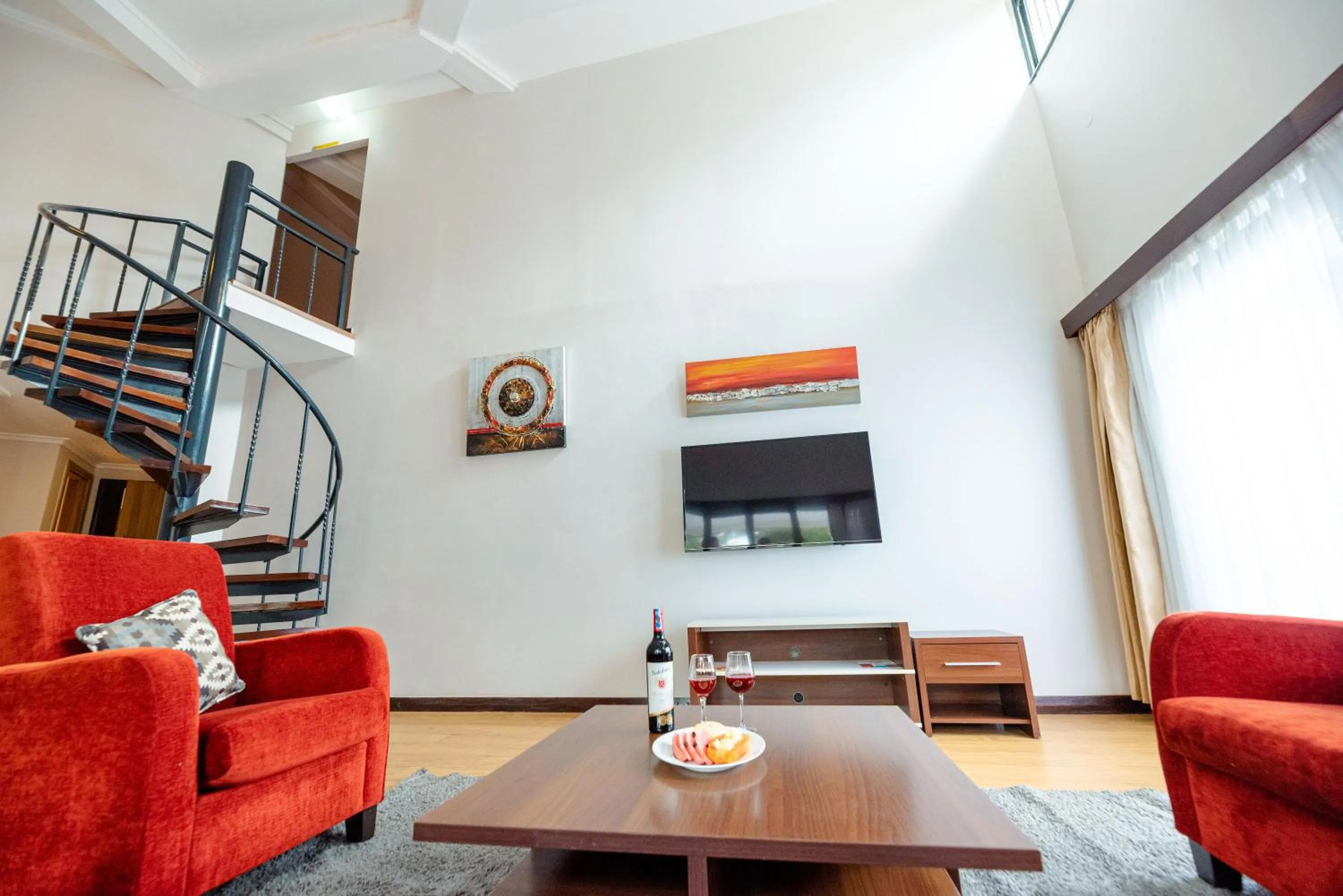 Seating area in Heri Heights Hotel Apartments, SureStay Collection by Best Western