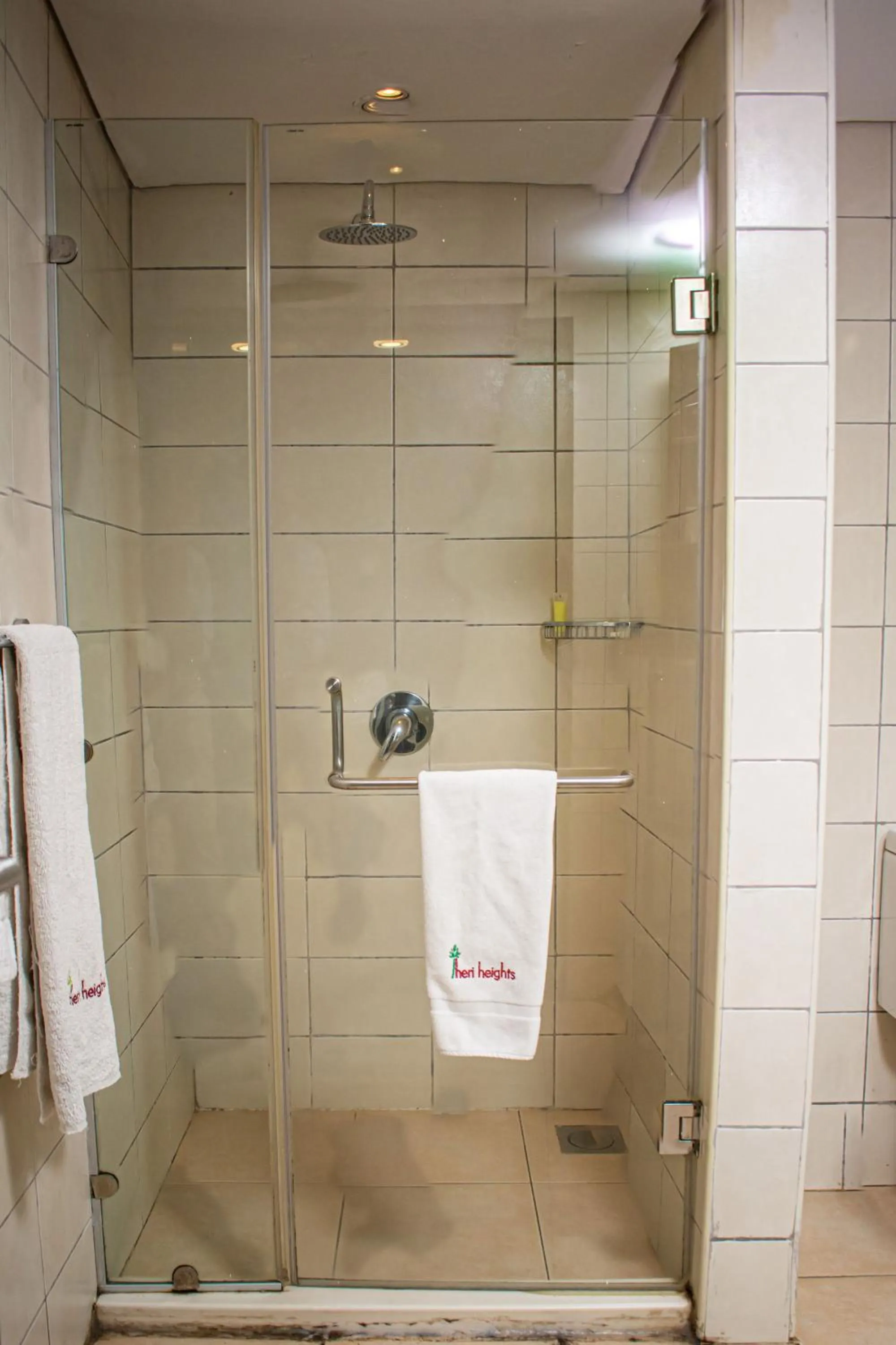 Bathroom in Heri Heights Hotel Apartments, SureStay Collection by Best Western