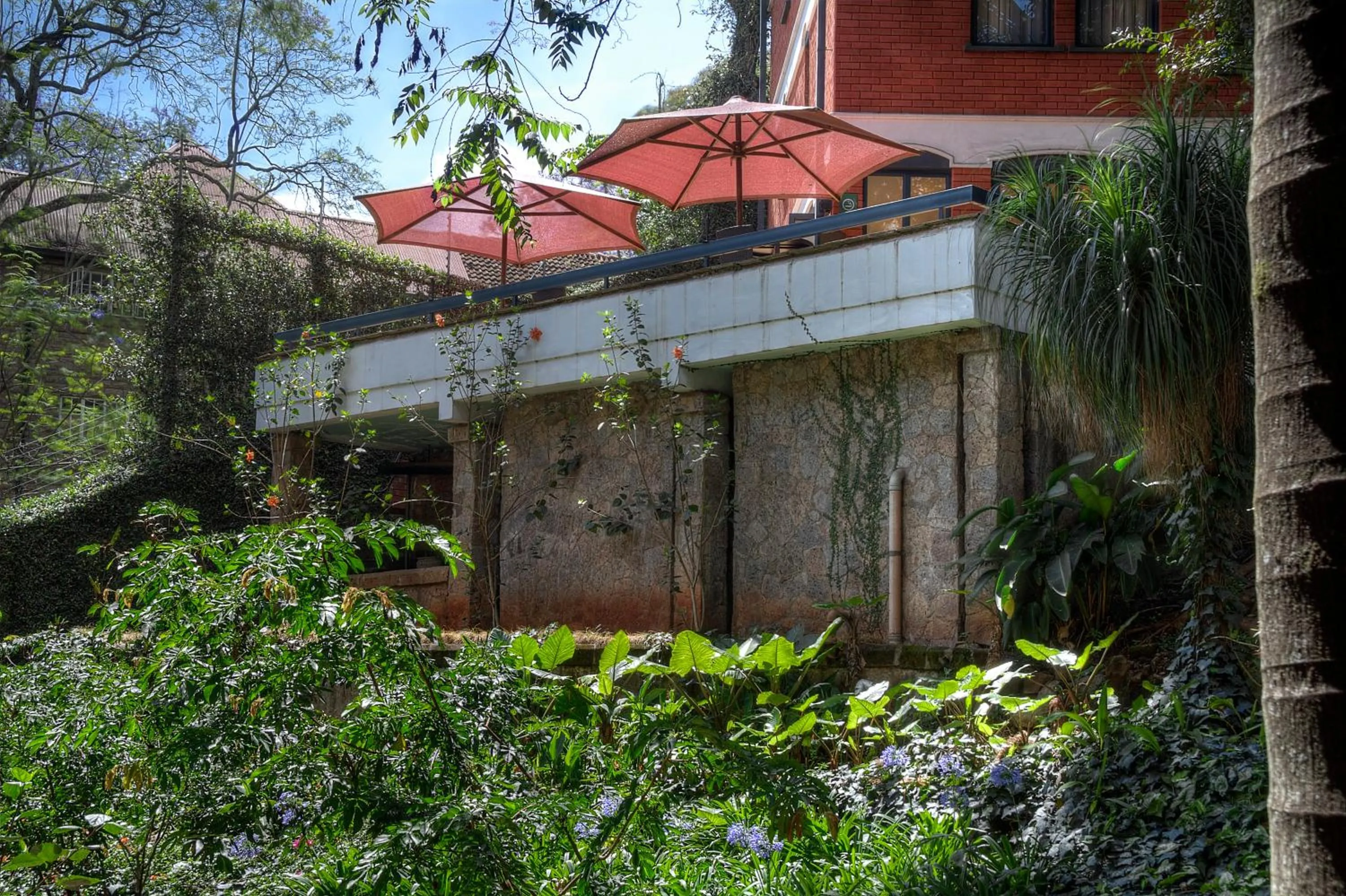 Property building in Heri Heights Hotel Apartments, SureStay Collection by Best Western