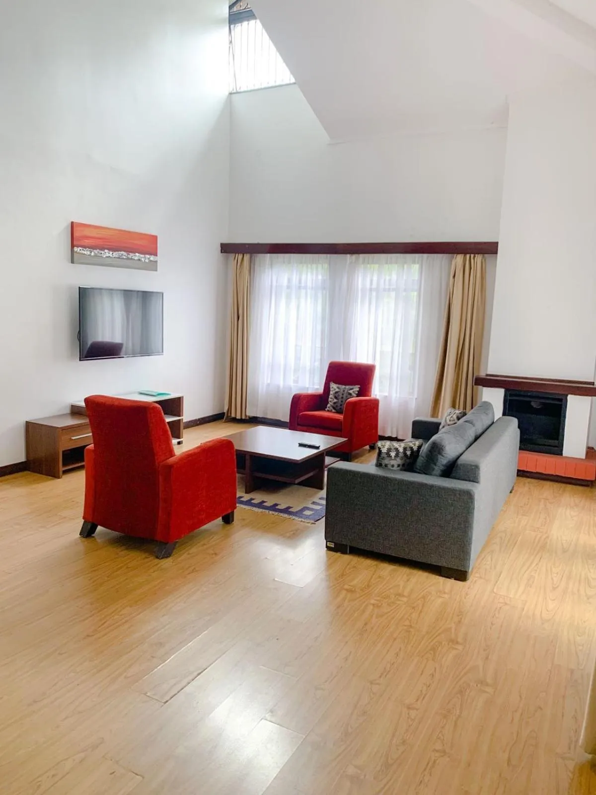 TV and multimedia in Heri Heights Hotel Apartments, SureStay Collection by Best Western
