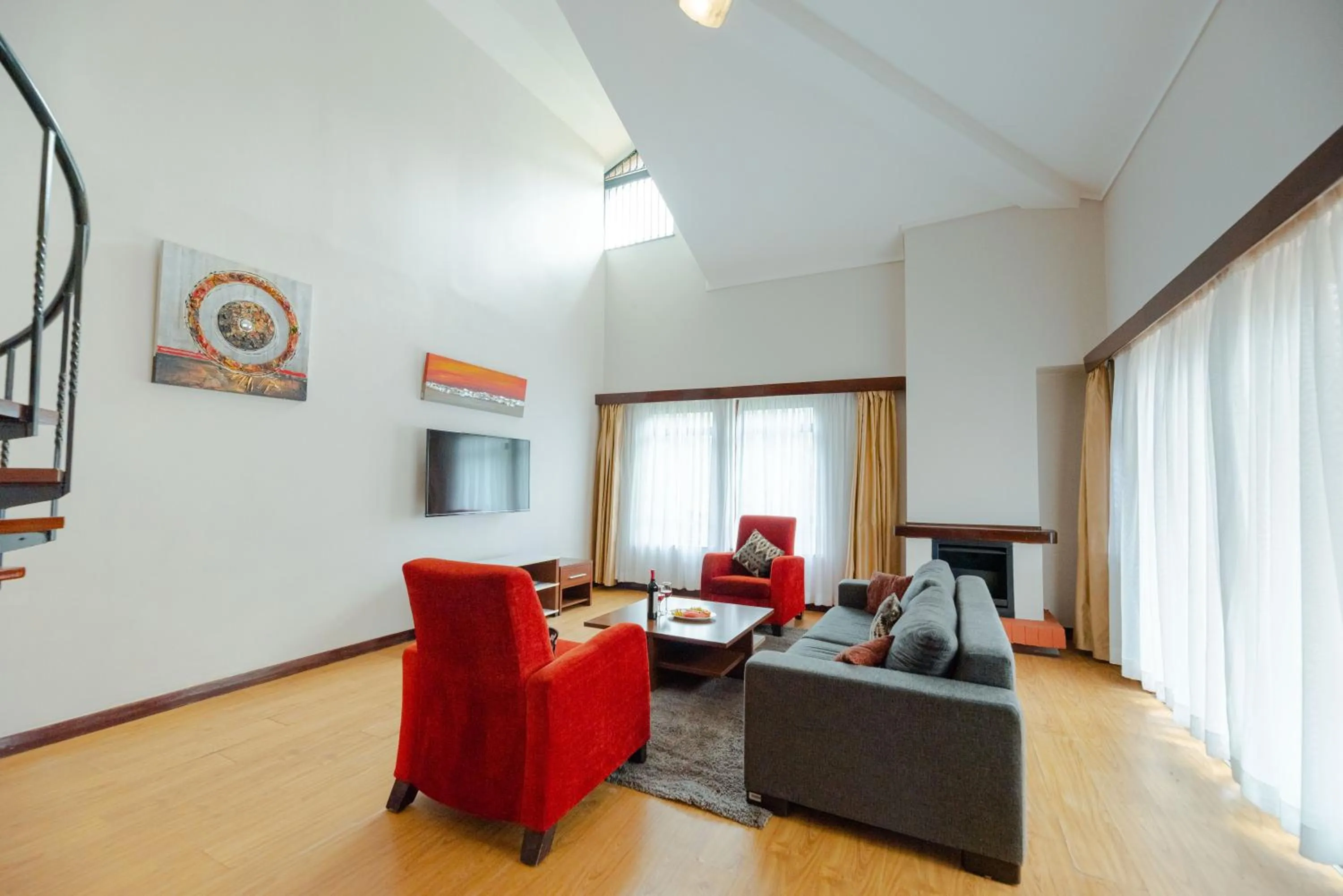 Living room in Heri Heights Hotel Apartments, SureStay Collection by Best Western