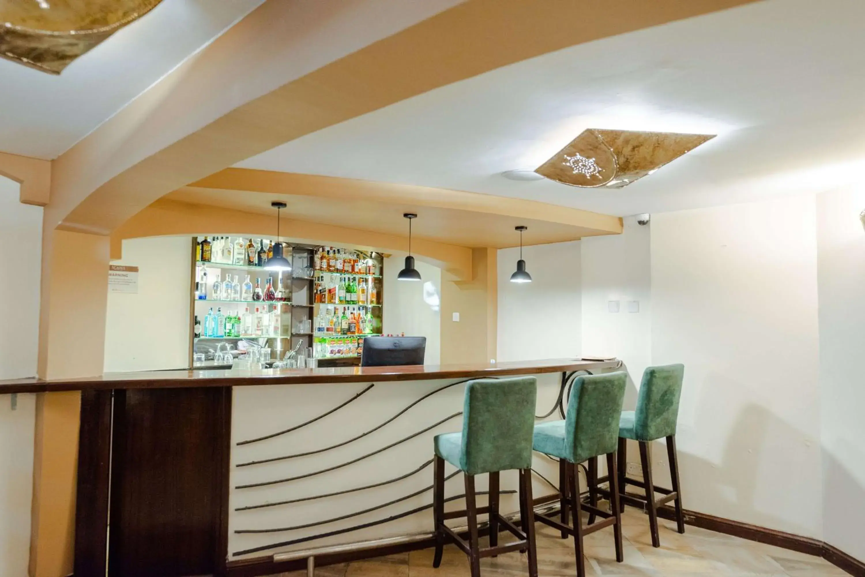 Lounge or bar in Heri Heights Hotel Apartments, SureStay Collection by Best Western Lounge or bar in Heri Heights Hotel Apartments, SureStay Collection by Best Western