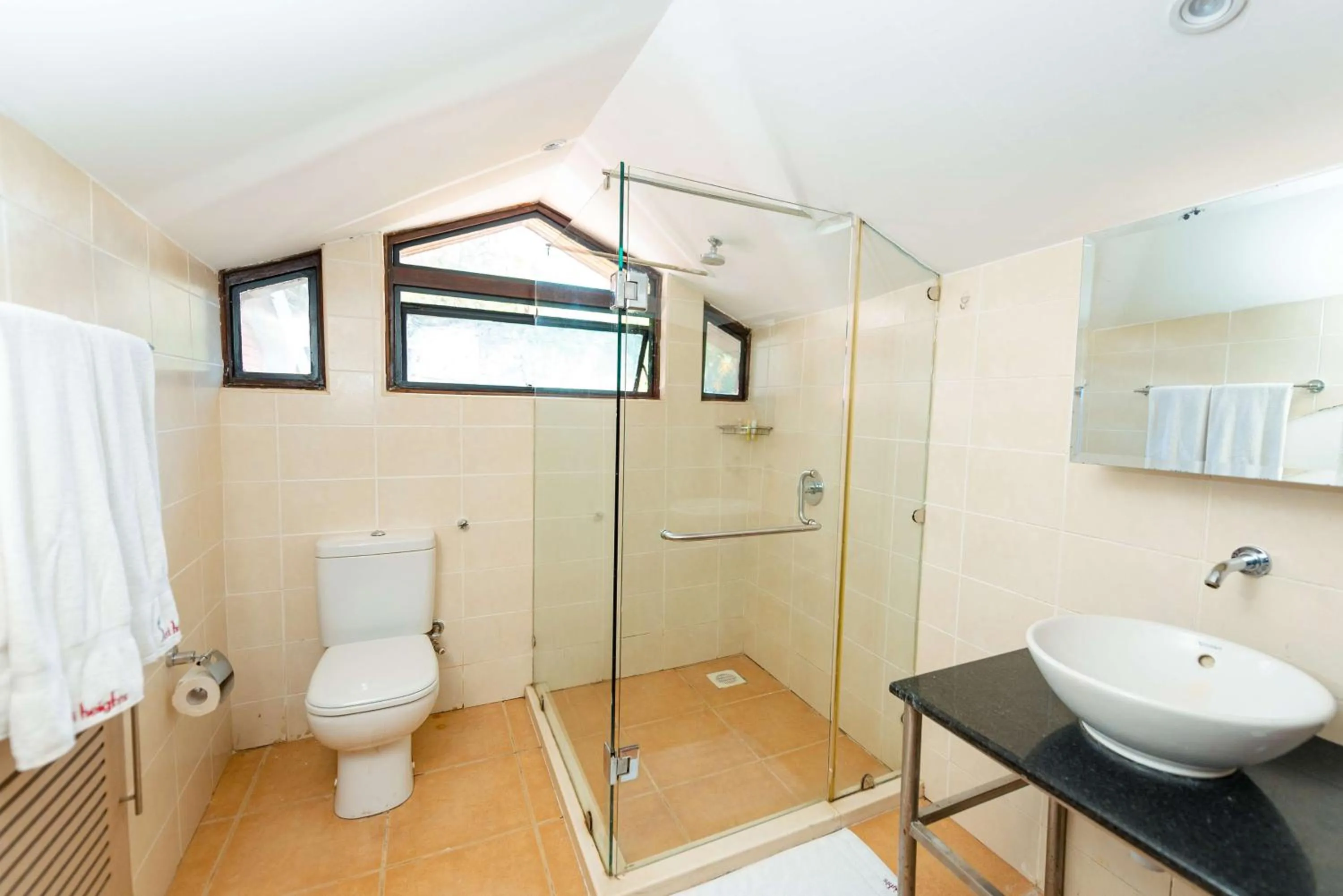 Bathroom in Heri Heights Hotel Apartments, SureStay Collection by Best Western