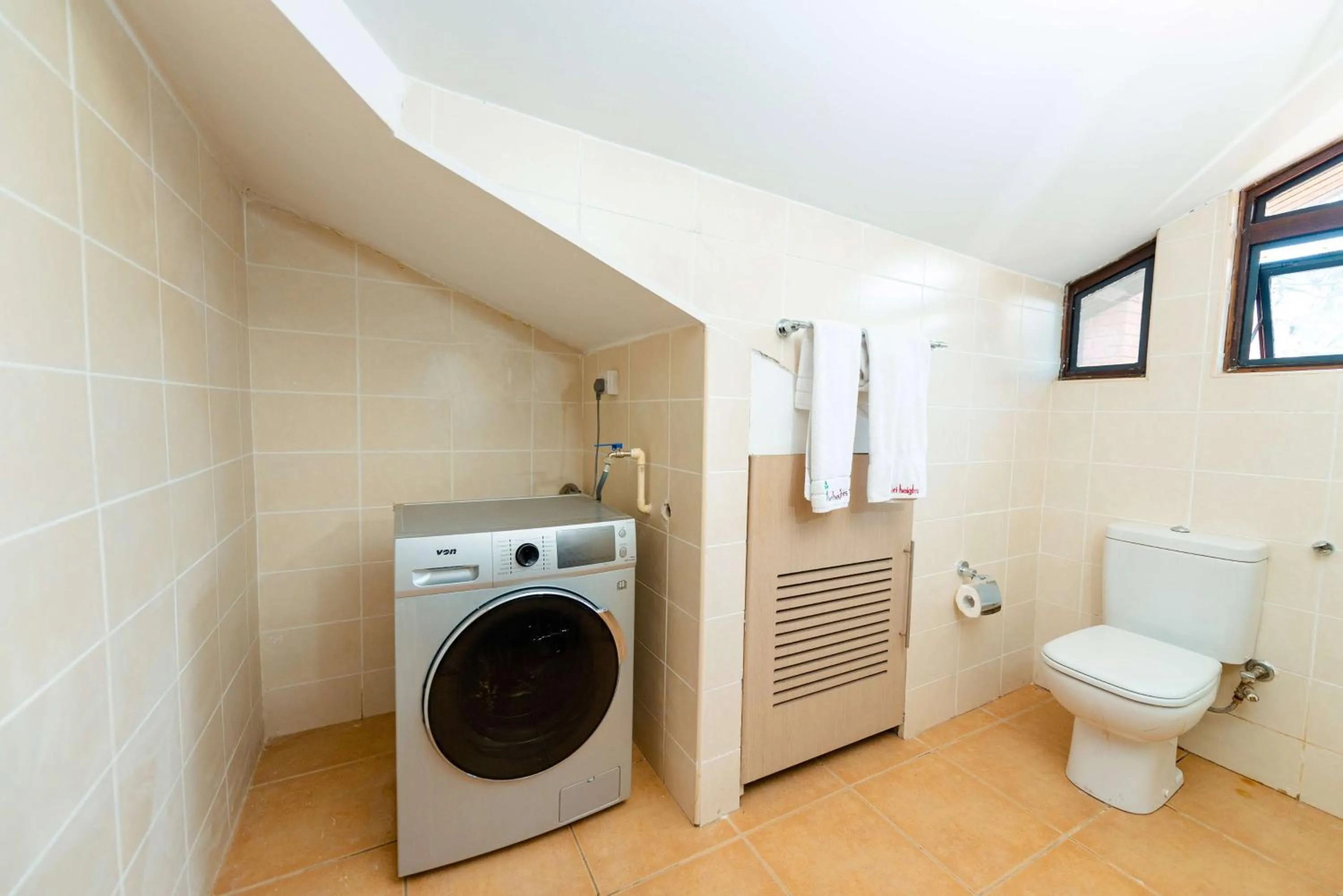 Bathroom in Heri Heights Hotel Apartments, SureStay Collection by Best Western
