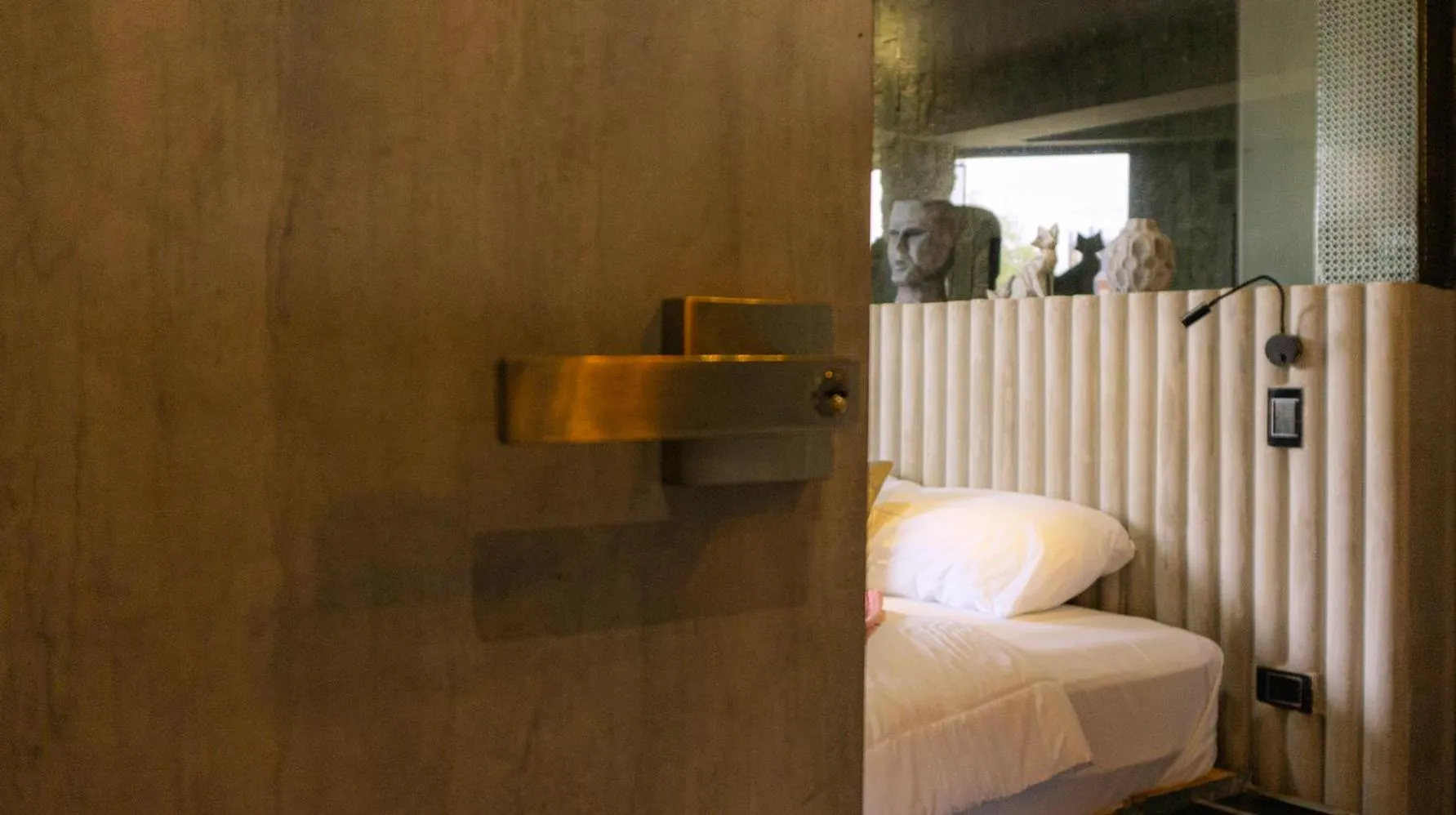 Bedroom in EleMYNT LifeStyle Hotel