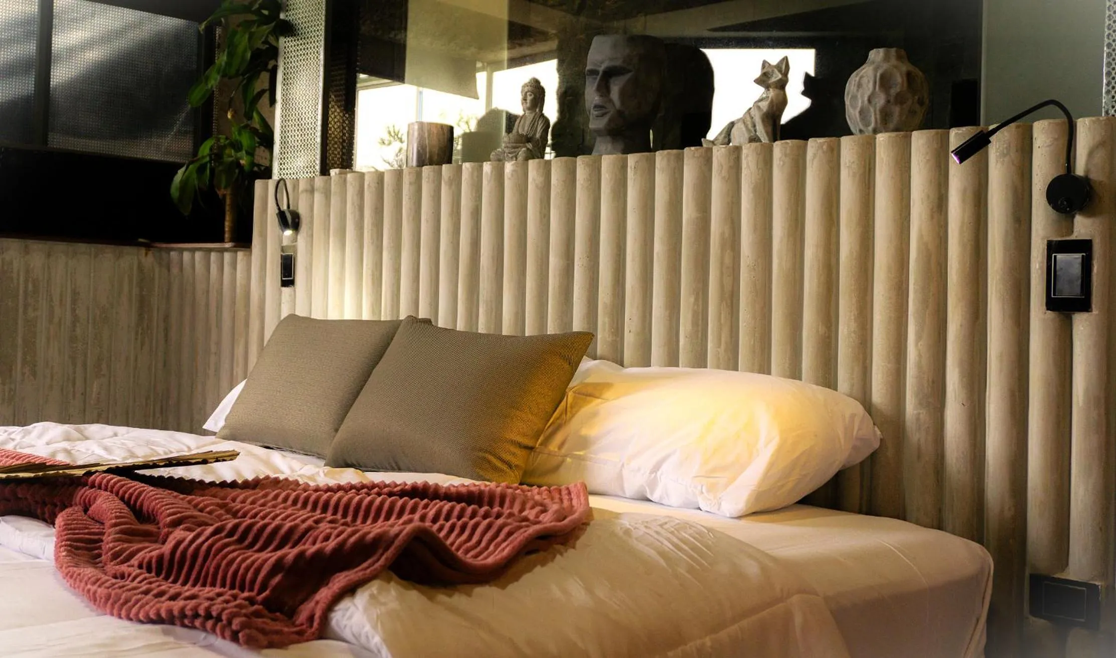 Bed in EleMYNT LifeStyle Hotel